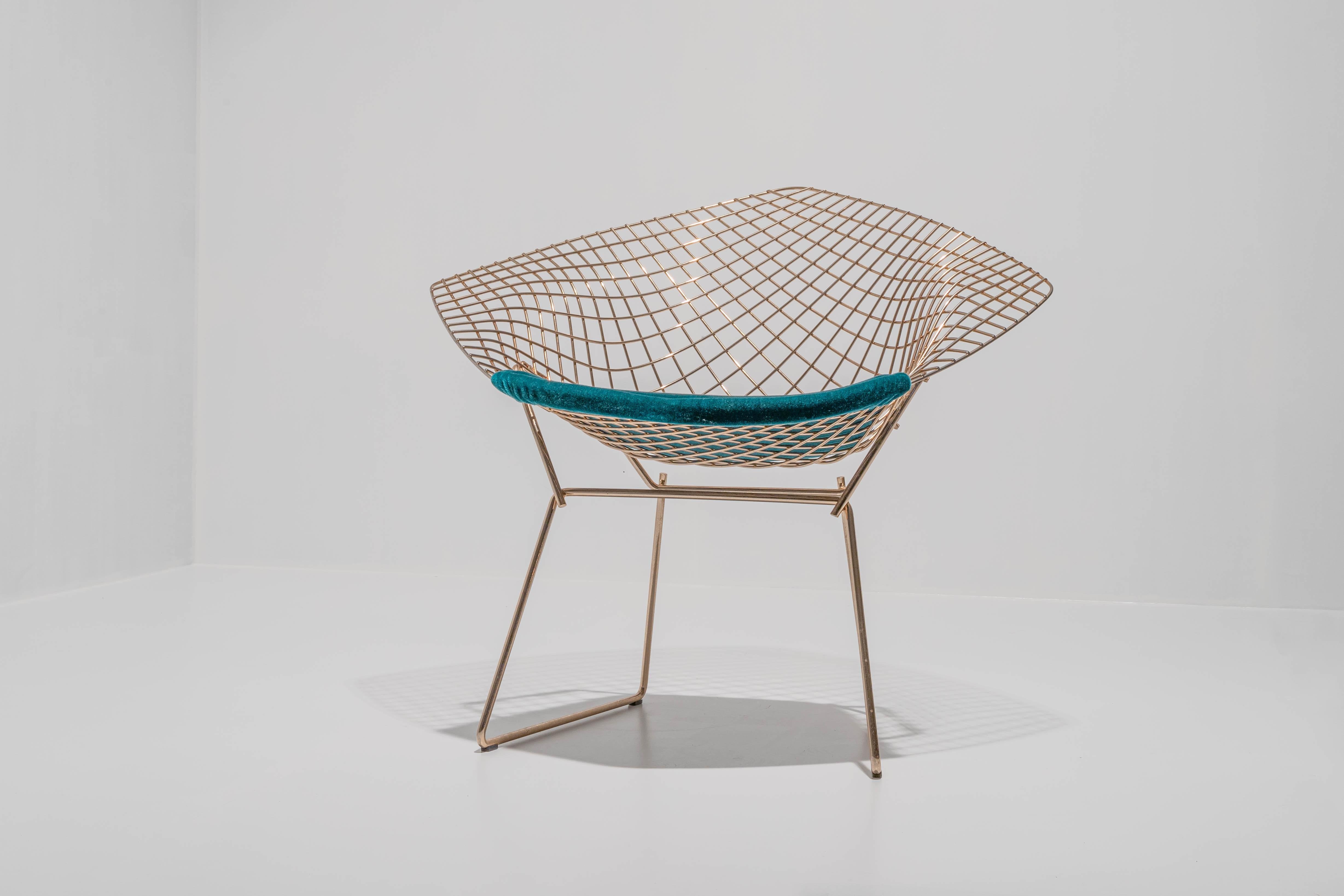 Diamond Chair by Harry Bertoia with 18K gold plated finish by Knoll international, limited edition in honour of his 100th birthday, USA.

Sculptor, furniture and jewelry designer, graphic artist and metalsmith, Harry Bertoia was one of the great