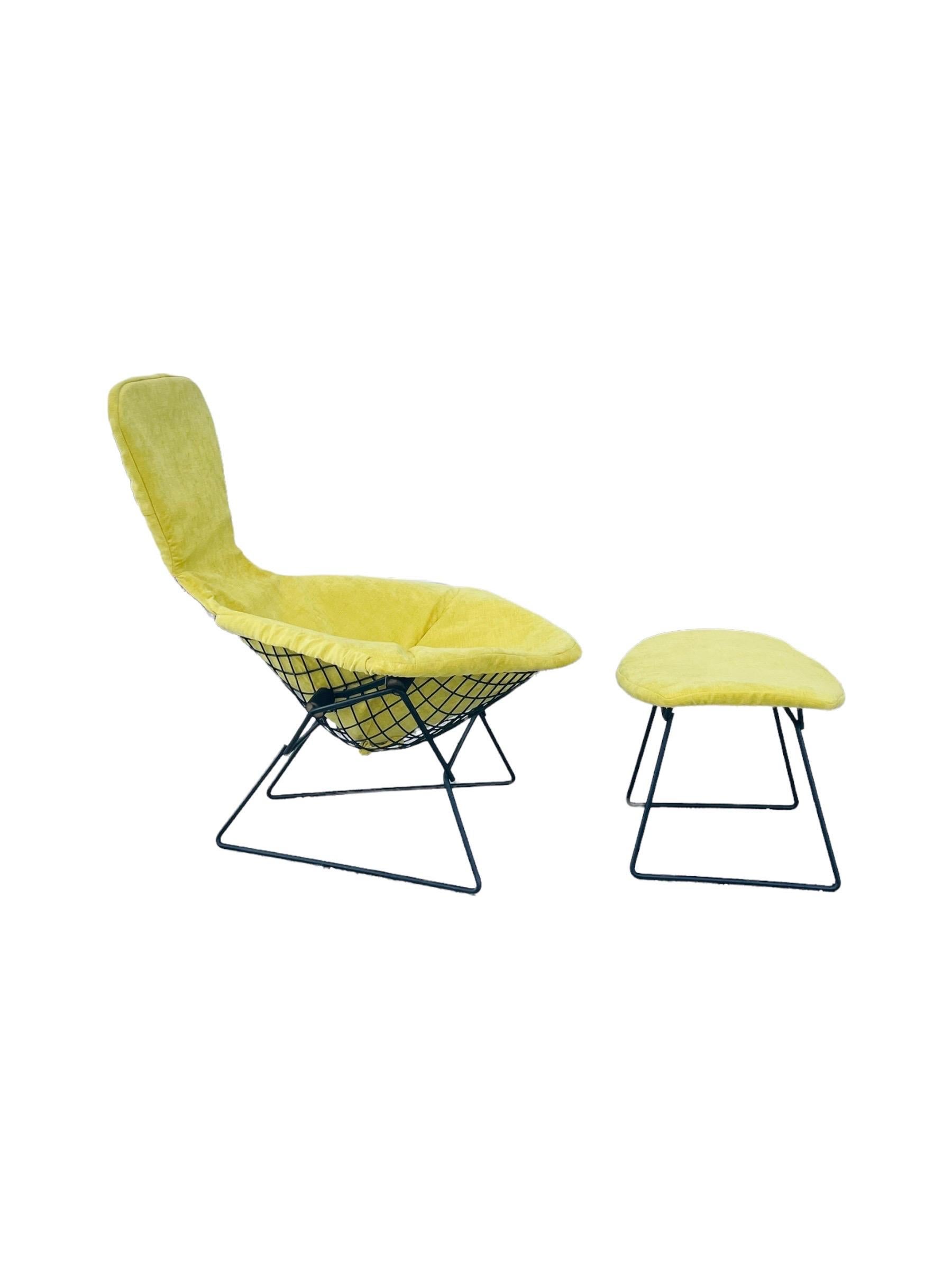 Stunning Mid-Century Modern “Bird Chair”with matching ottoman designed by Harry Bertoia for Knoll. This beautiful chair is newly reupholstered in Yellow krypton Fabric. The fabric is stain resistant and extremely durable. Frame has some repair