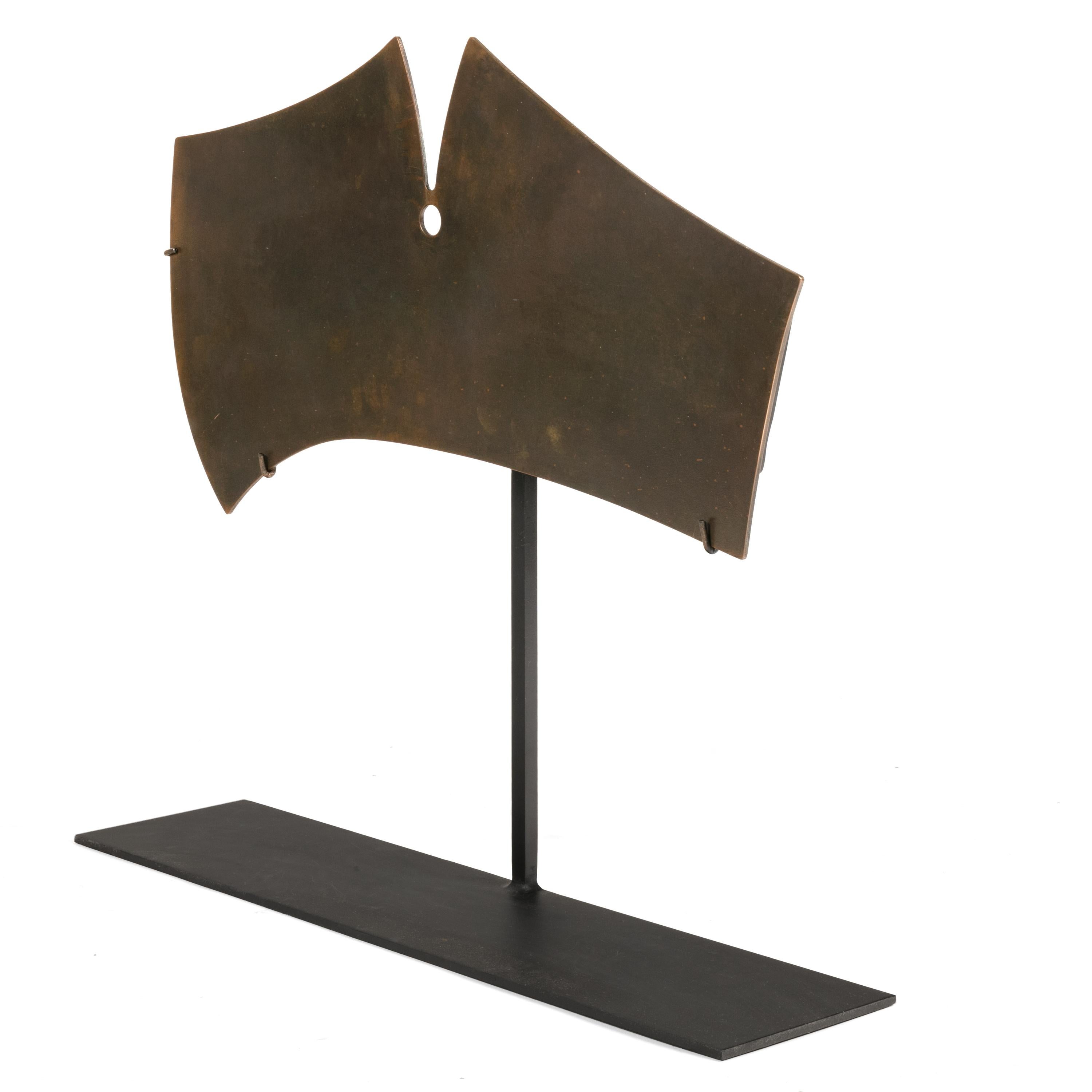 A wonderfully irregular form for a Bertoia gong. It comes with a stand but can be hung to produce a delightful tone.