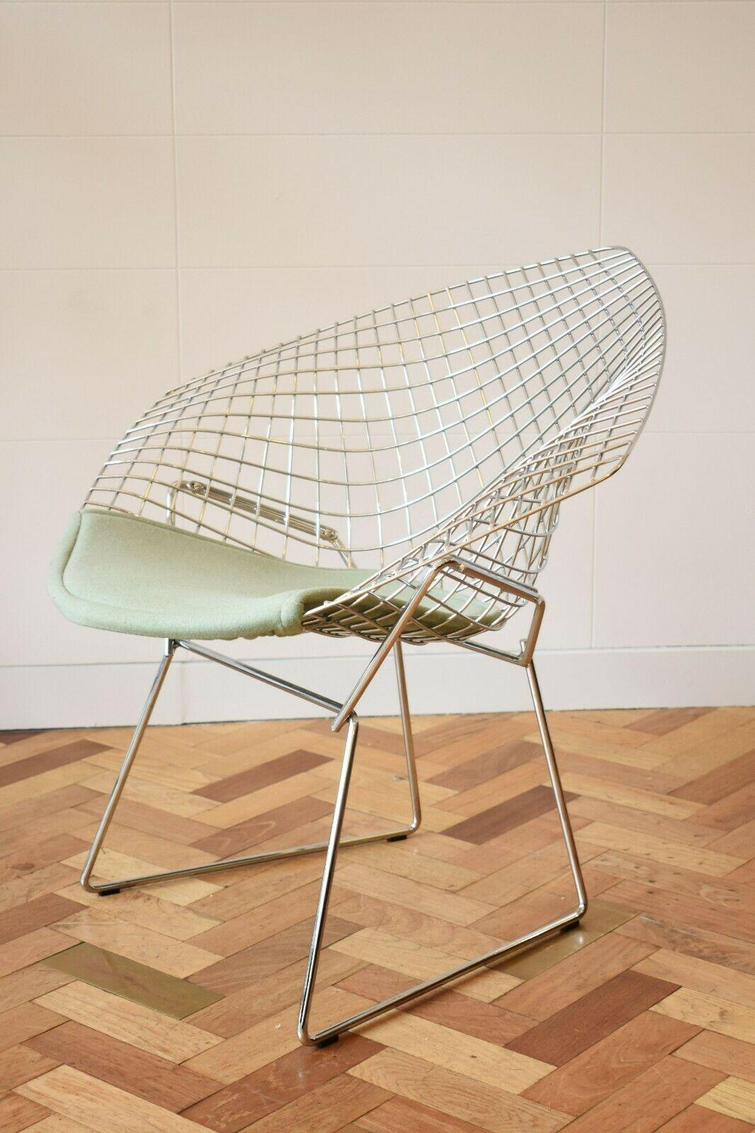 The Iconic 1952 Diamond Chair designed by Harry Bertoia as part of his Wire Collection, manufactured by Knoll International.
This amazing chair is crafted from chromed aluminium wire, interlaced into a dramatic and ergonomic diamond shape with