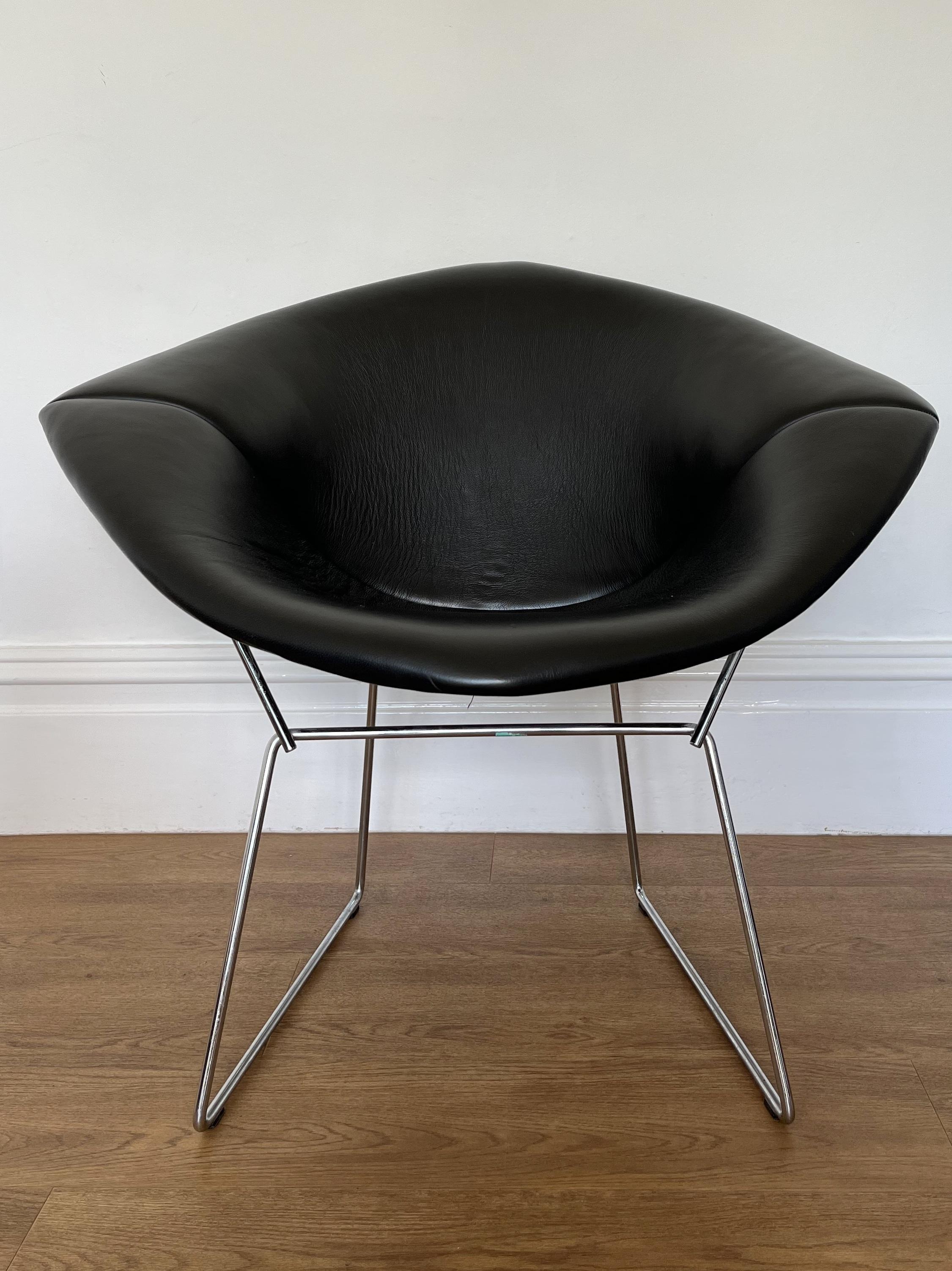 Originally designed in 1952 by Harry Bertoia the Diamond chair is unquestionably one of the most iconic chairs from the mid 20th century.

The chair has a hand welded, polished chrome frame with a black leather cover that is attached to the frame