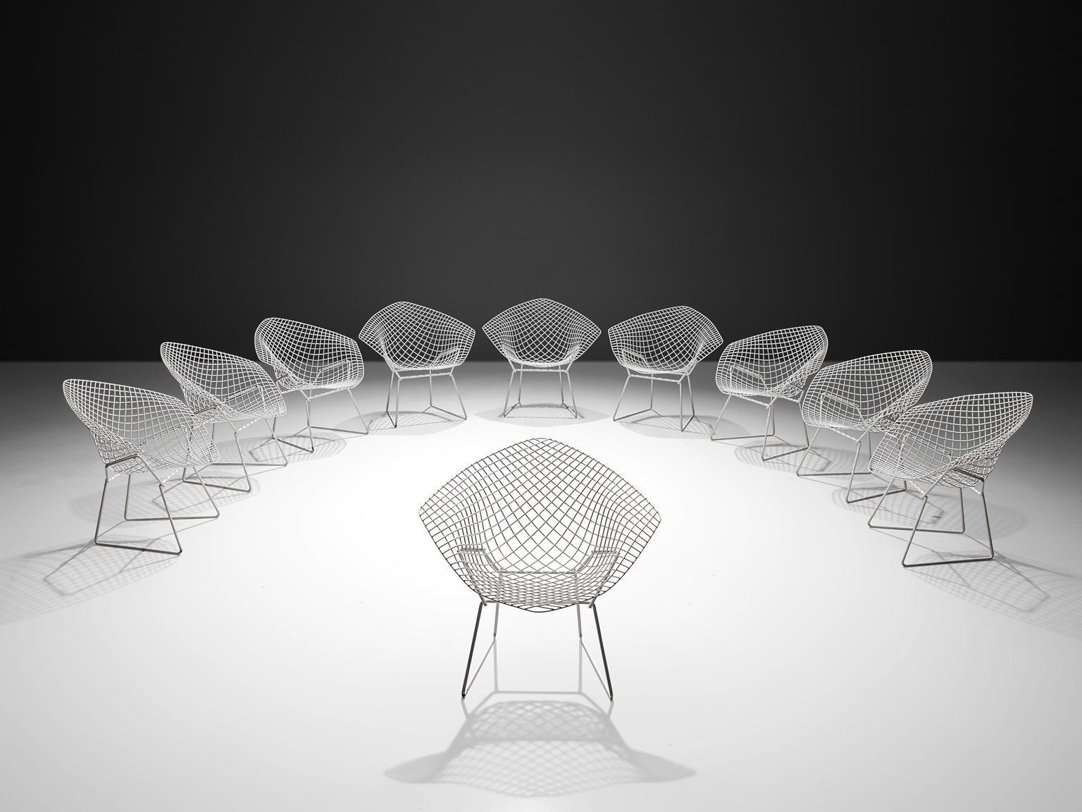 Harry Bertoia for Knoll, 'Diamond' chairs, white coated metal, United States, 1950s (later production)

The Diamond Chair is, according to Knoll, an astounding study in space, form and function by one of the master sculptors of the last century.
