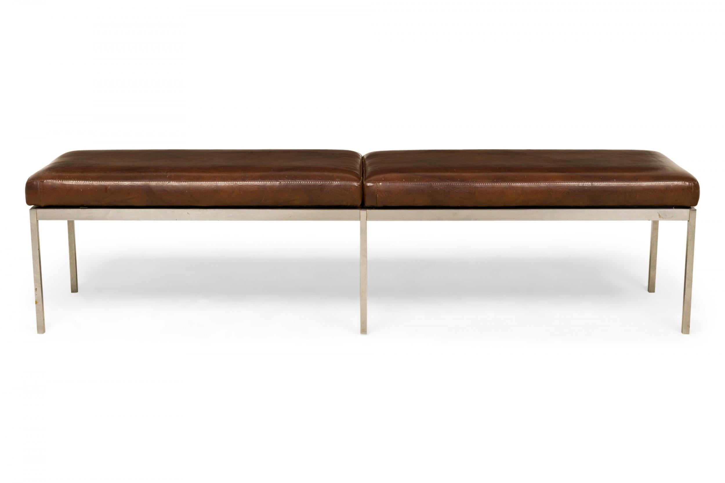 American Mid-Century rectangular bench with a two section chocolate brown leather upholstered seat resting on a square chrome tube frame. (HARRY BERTOIA FOR KNOLL ASSOCIATES).
 