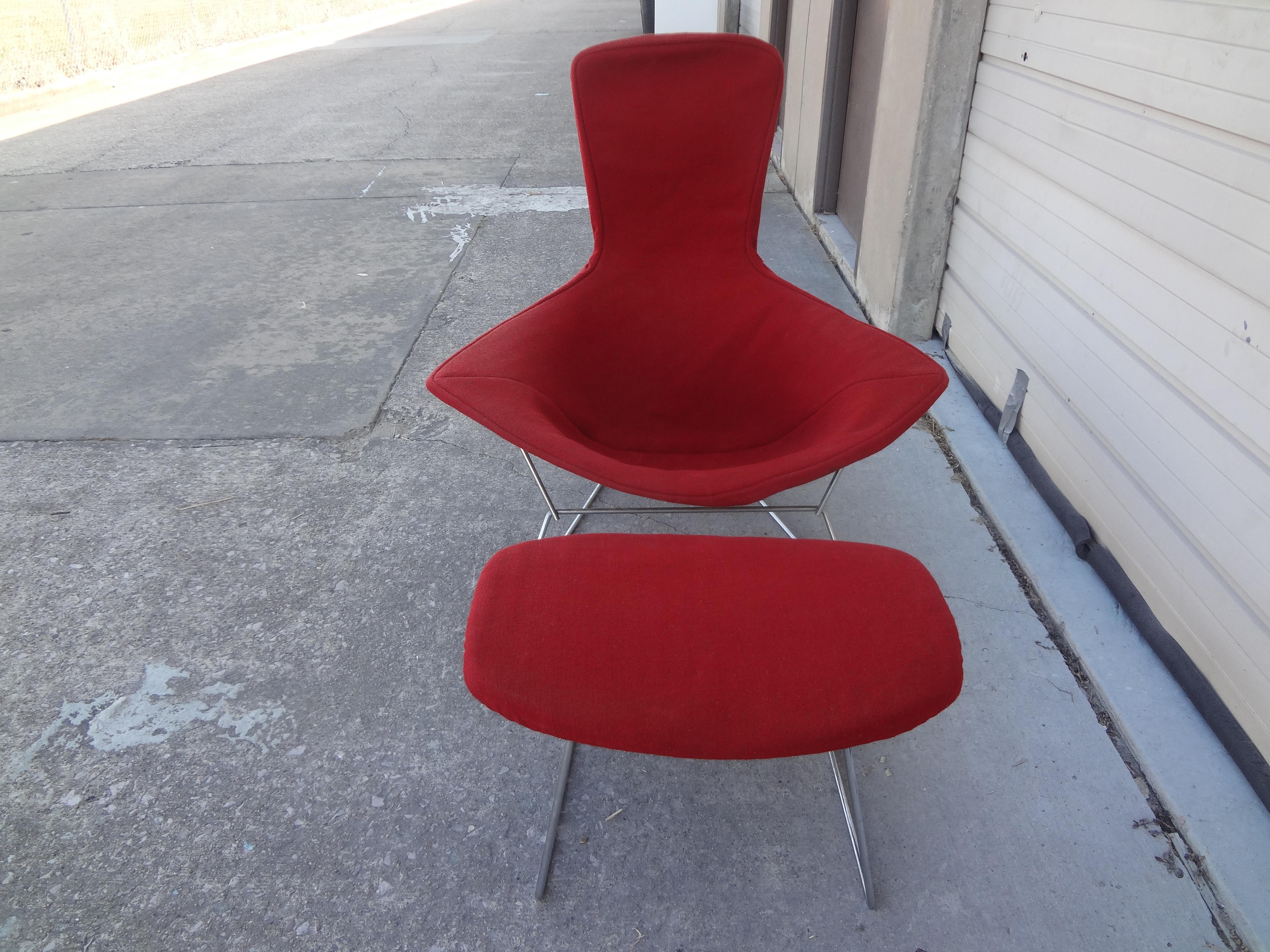 Harry Bertoia for Knoll International bird chair and ottoman. This iconic lounge chair and ottoman were originally designed by Harry Bertoia in 1952 and manufactured by Knoll International. Each retains the original upholstery. Made of steel, this