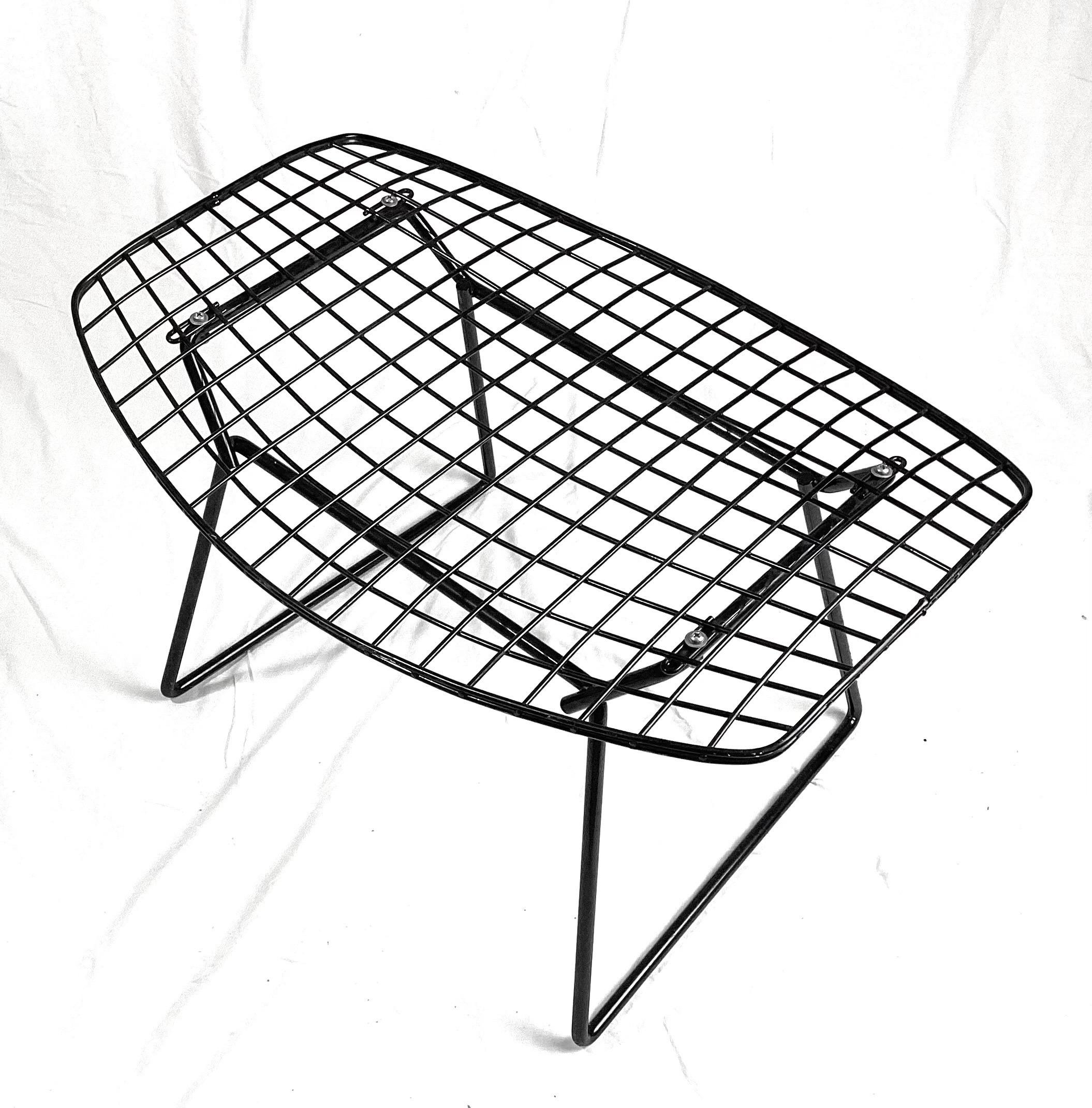 Harry Bertoia for Knoll black wire ottoman. Structure is solid, paint is clean with just a couple of small dings in one leg. Please note photo.