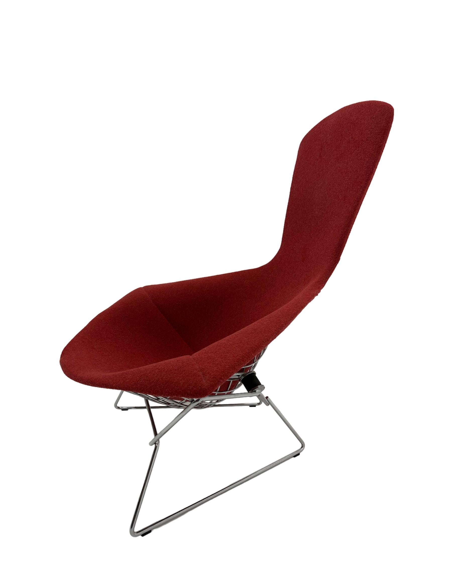 Harry Bertoia for Knoll International bird chair. This iconic lounge chair and ottoman were originally designed by Harry Bertoia in 1952 and manufactured by Knoll International. Each retains the original upholstery. Made of steel, this set was made