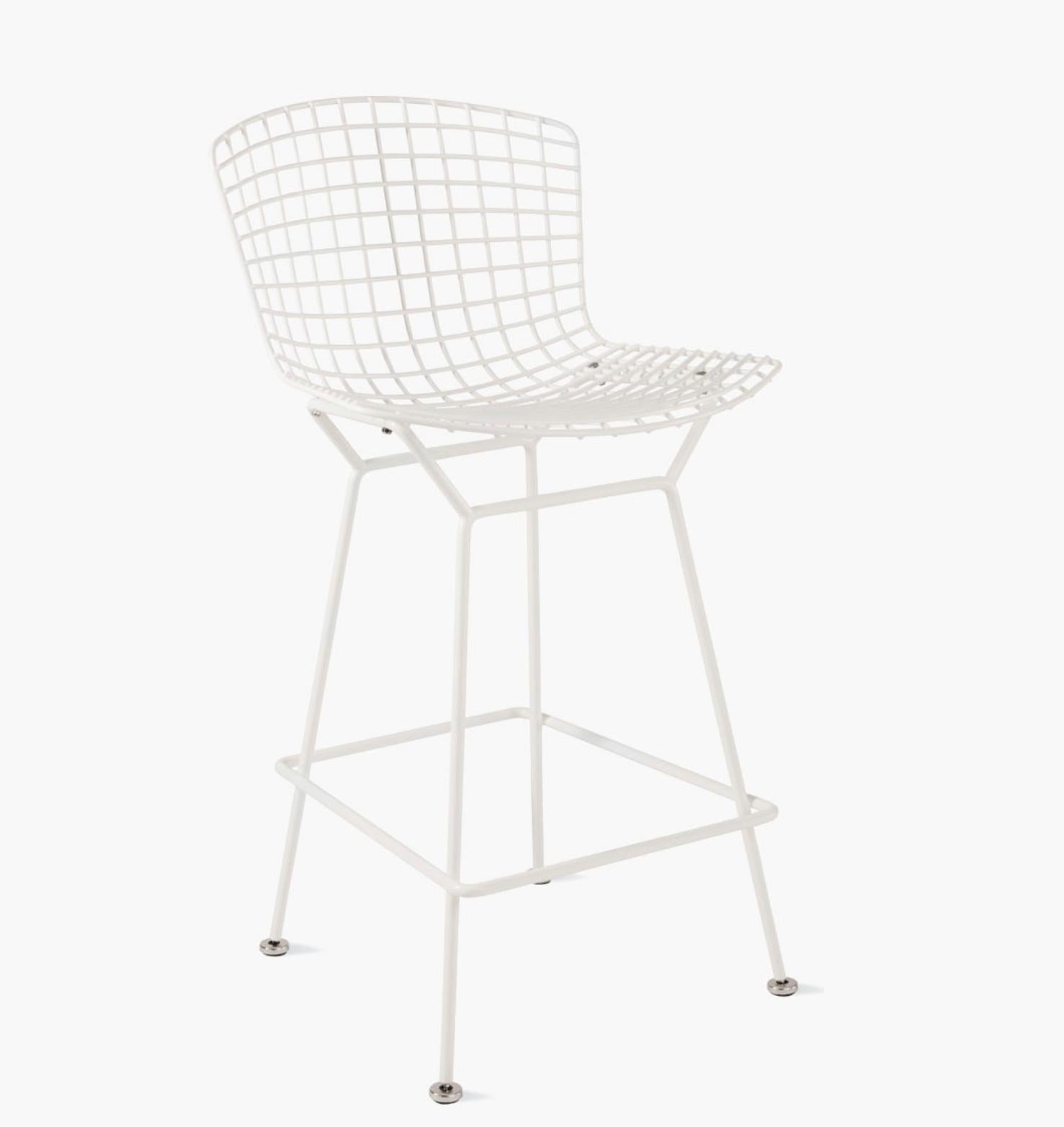 This listing is for a pair (2) of Harry Bertoia for Knoll White Counter Stools.   
Featuring delicate filigreed construction that's supremely strong, the airy seats of the Bertoia Seating Collection (1952) are sculpted out of steel rods and have a