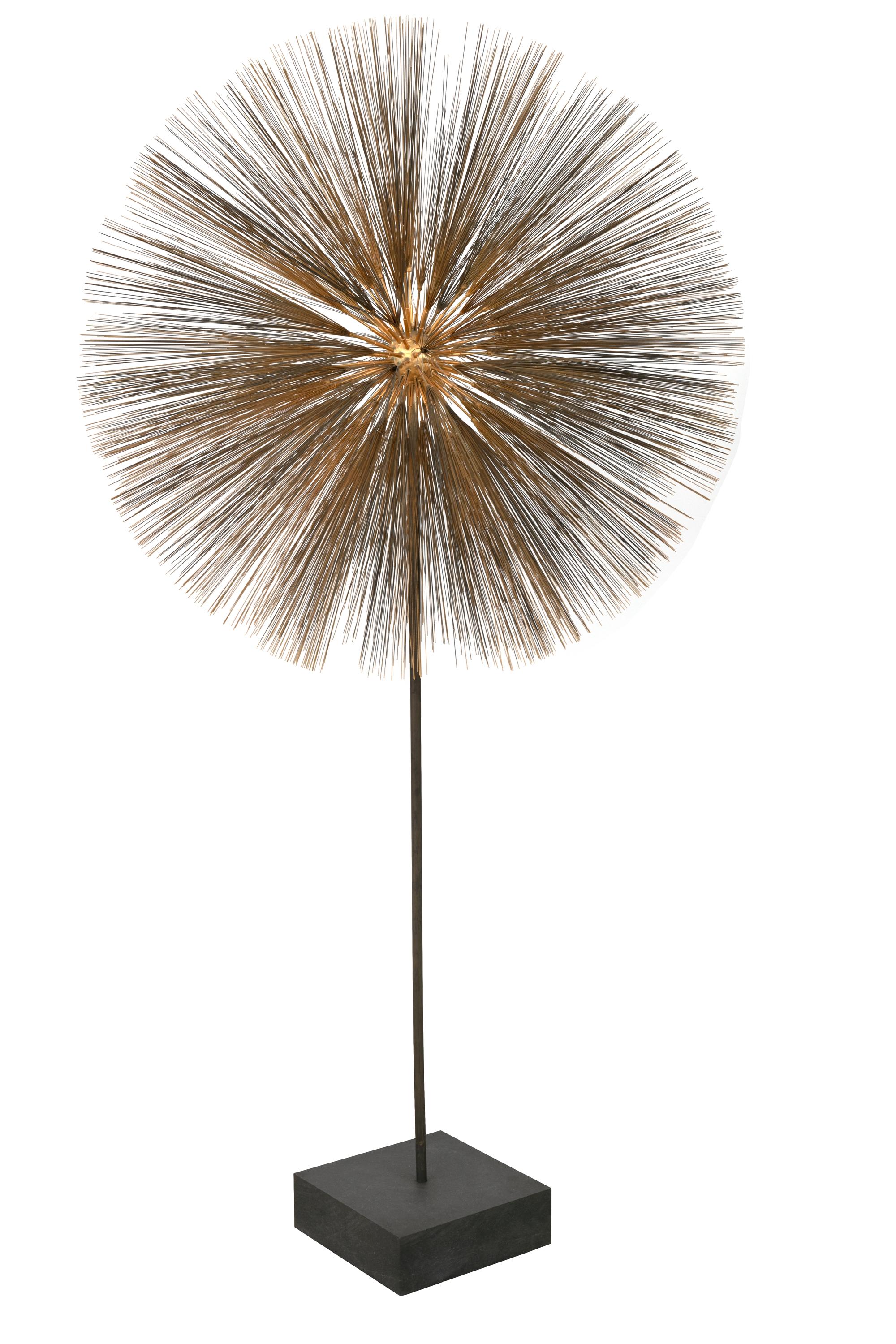 Bertoia's Dandelion form is widely regarded to be the apex of his career. An overwhelming physical presence is balanced by its truly delicate nature. A gilt bronze central sphere is the basis of the form, created by successive application of