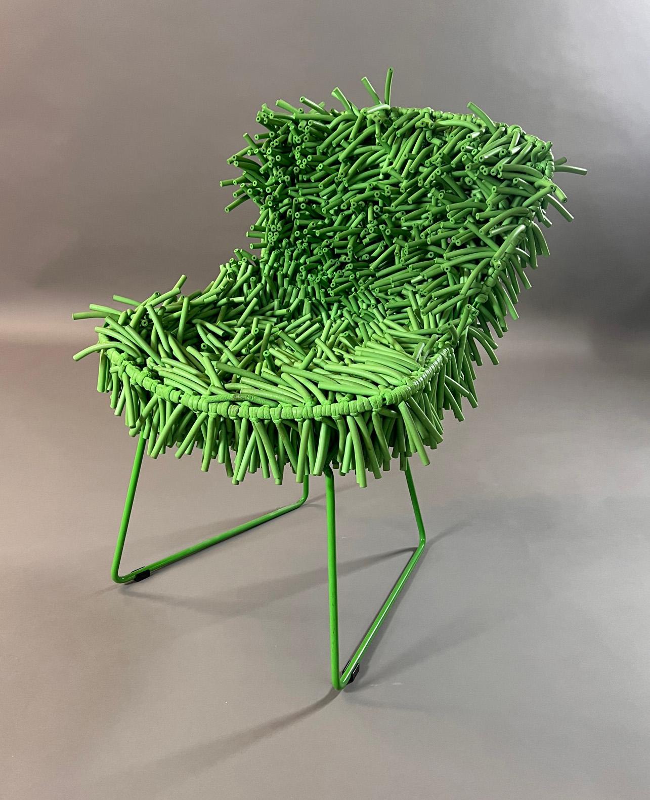 Incredible and unique iteration of an iconic modern Harry Bertoia Classic. Douglas Homer has made a special edition chair unlike anything else. In fun color and design this chair will be a statement piece in any room.