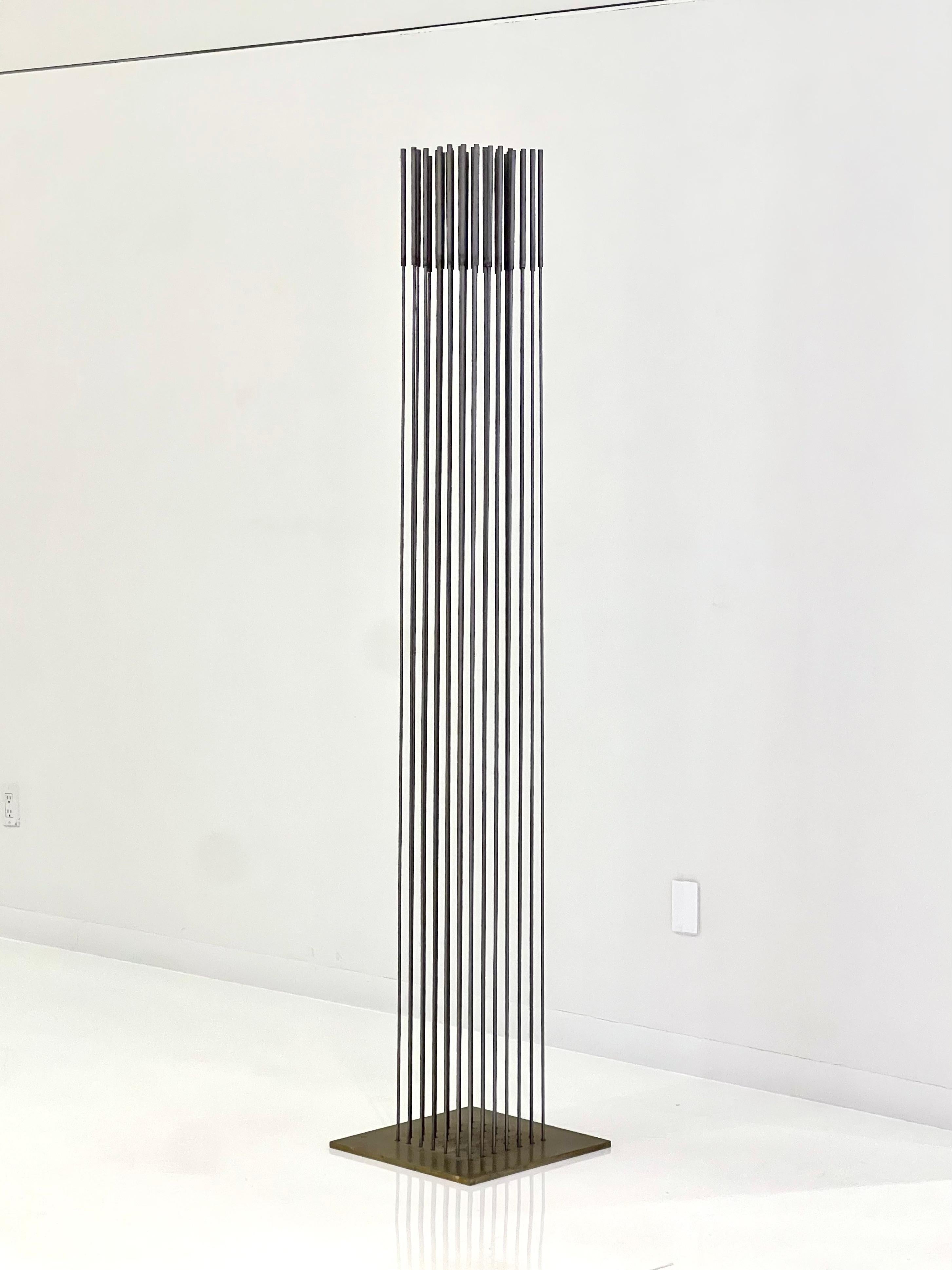 Harry Bertoia, Monumental Sonambient Sculpture, USA, circa 1970's.
Inconel on brass plate, comprised of 49 rods in a 7 x 7 layout with cattails, unmarked. Measures H: 81, W: 16, D: 16 in.

Provenance:
Commissioned directly from Harry Bertoia via
