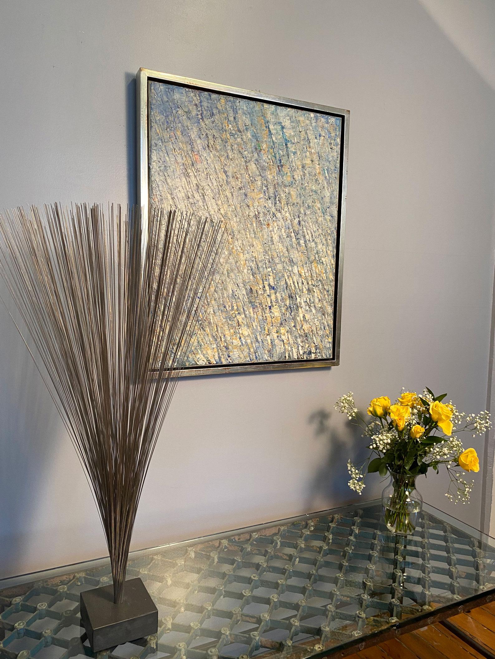 Bertoia’s spray sculptures are his most elegant sculpture creations.  While they do not make any sound, they are meant to be “played” with and are carefully orchestrated to move in a hypnotic and graceful manner.  Whether gathered in one’s hand and
