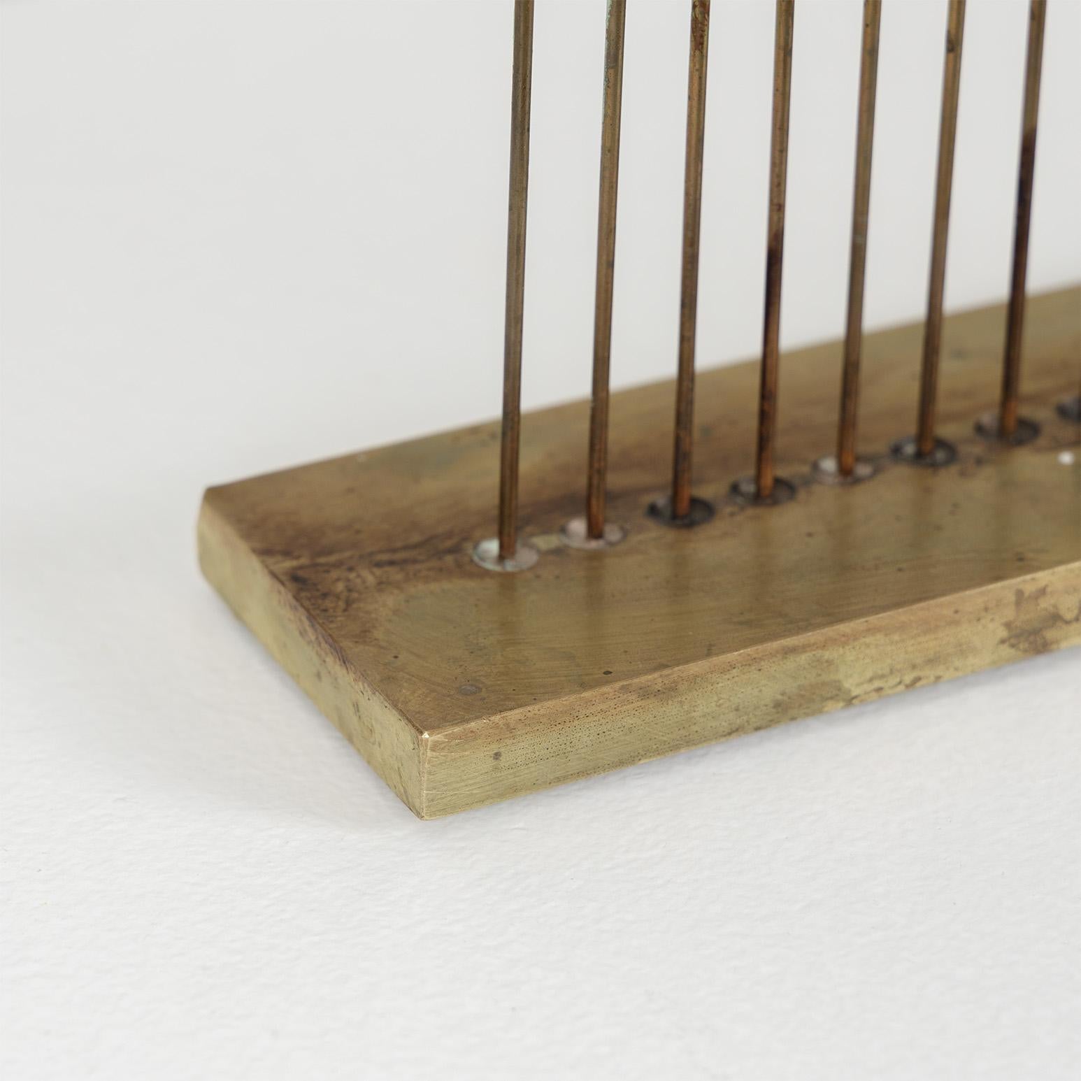 Italian-born American artist Harry Bertoia (1915-1978), is a noted sculptor and modern furniture designer. He is arguably one of the most successful creative forces hired by Florence Knoll in the 1950's. His metal wire chairs are true icons of 20th