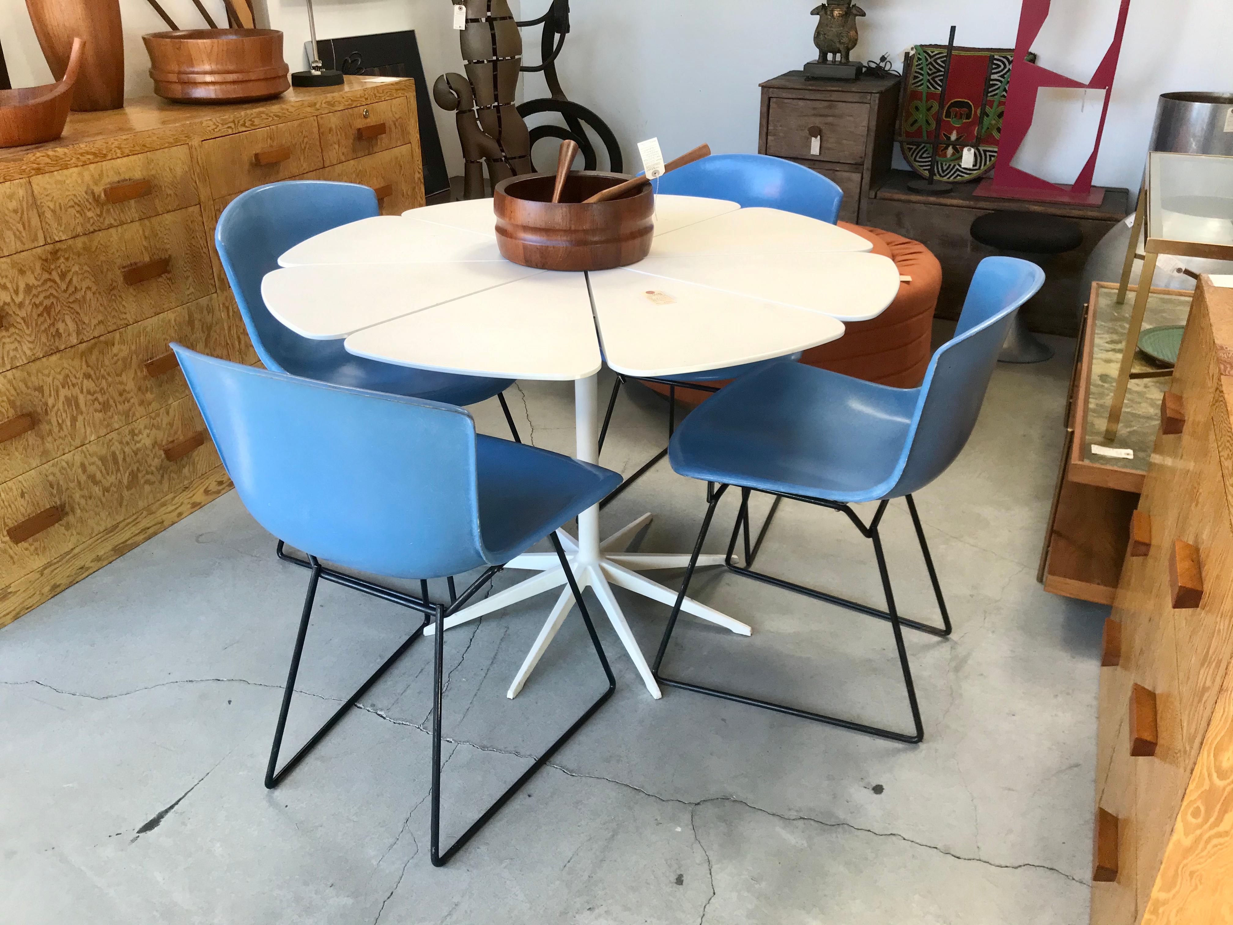 Classic early modernist design
Limited production design for only one year
Wonderful periwinkle blue molded fiberglass form
Architectural enameled steel base
Original screws and condition
Solid and sturdy
Great in a breakfast nook, office or