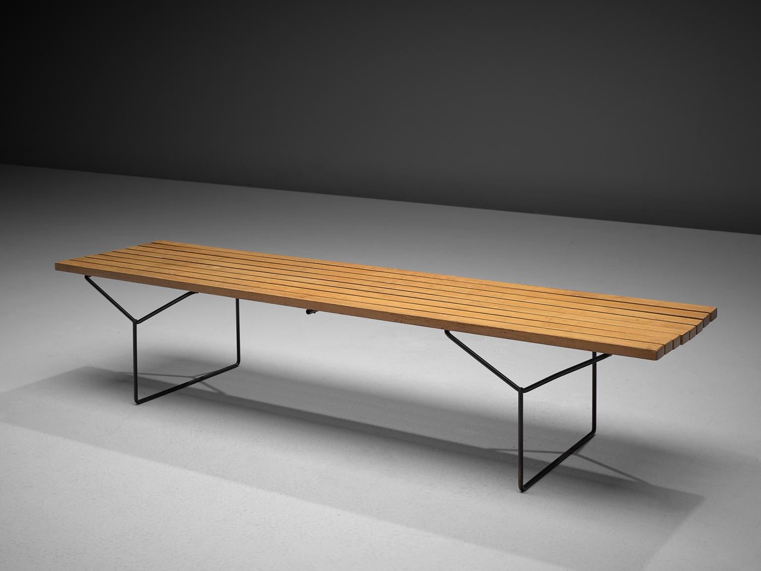 Harry Bertoia for Knoll, slat bench, beech and metal, United States, 1950s.

Stunning early slat bench designed by Harry Bertoia, manufactured by Knoll, USA 1950s. This functional and elegant bench / coffee table combined with a thin black bended