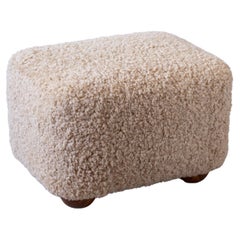 "Harry" footstool with sheepskin and beech legs