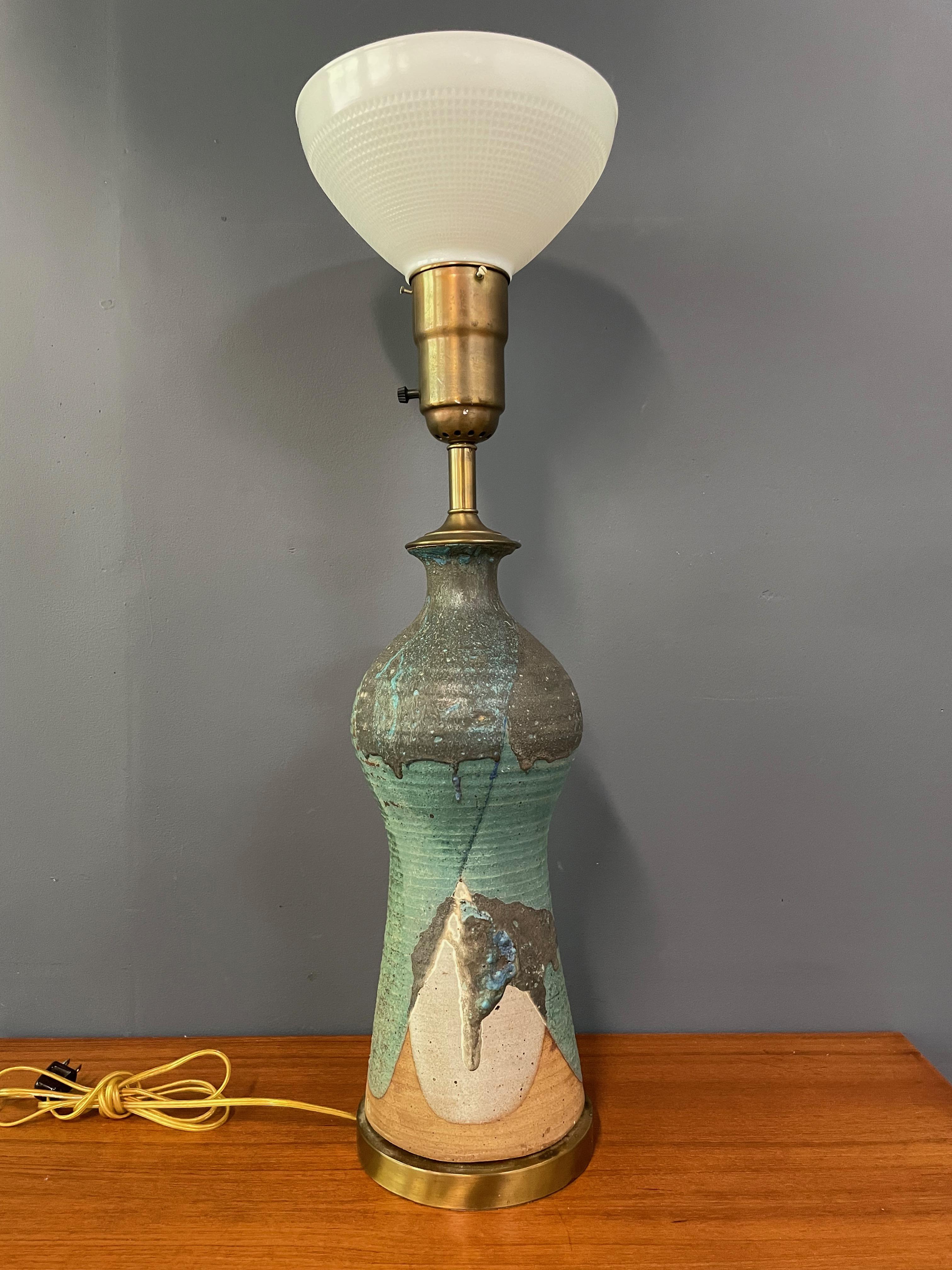 Incredible, fantastically glazed ceramic lamp by respected ceramicist Harry Holl. This lamp was in his personal collection. Impressive in size this piece was made as a lamp, hence the hole for the cord at the bottom, at some point in time the cord