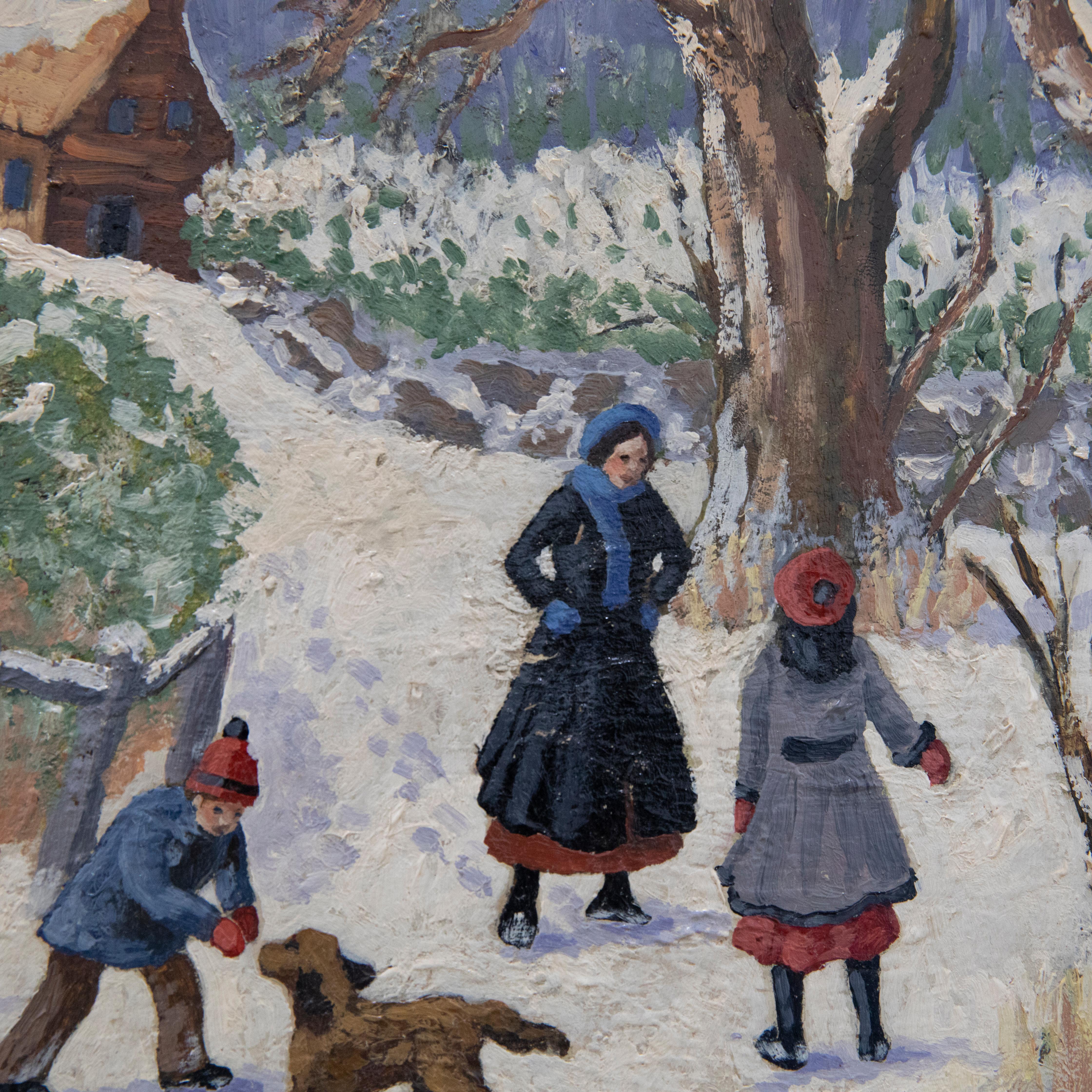 A charming early 20th Century oil scene showing a mother and two children playing in the snow with their dog with a little wooden house in the distance. The artist has signed to the lower left corner and the painting has been presented in a white