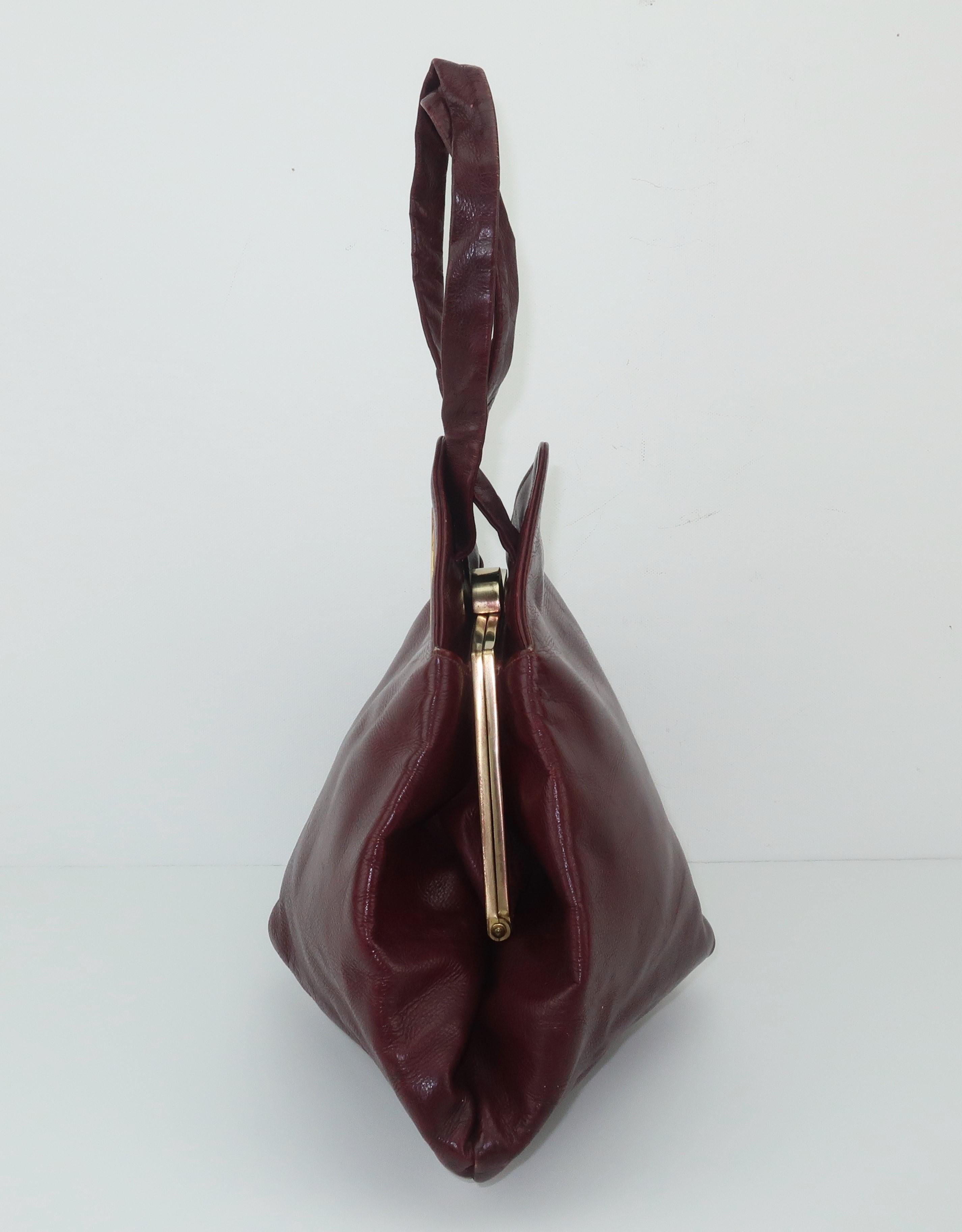 oxblood leather handbag