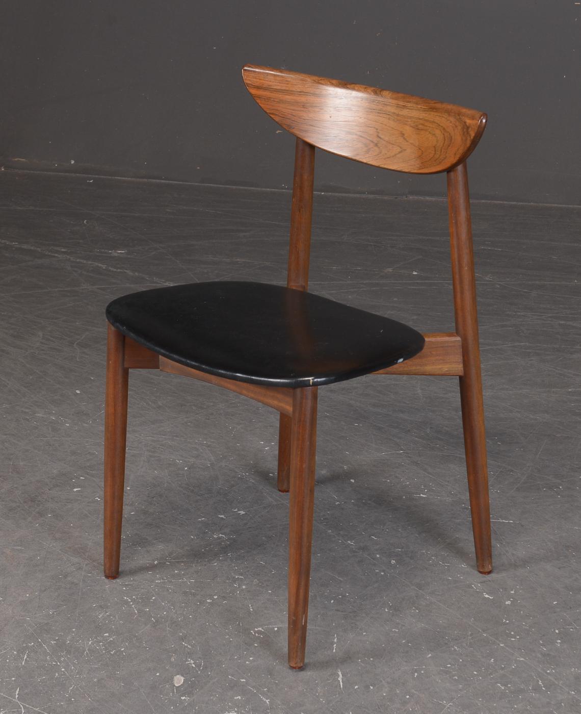 Hardwood frame with leather upholstered seat. Designed by Harry Østergaard for Skovby Møbelfabrik in the 1960s in Denmark.