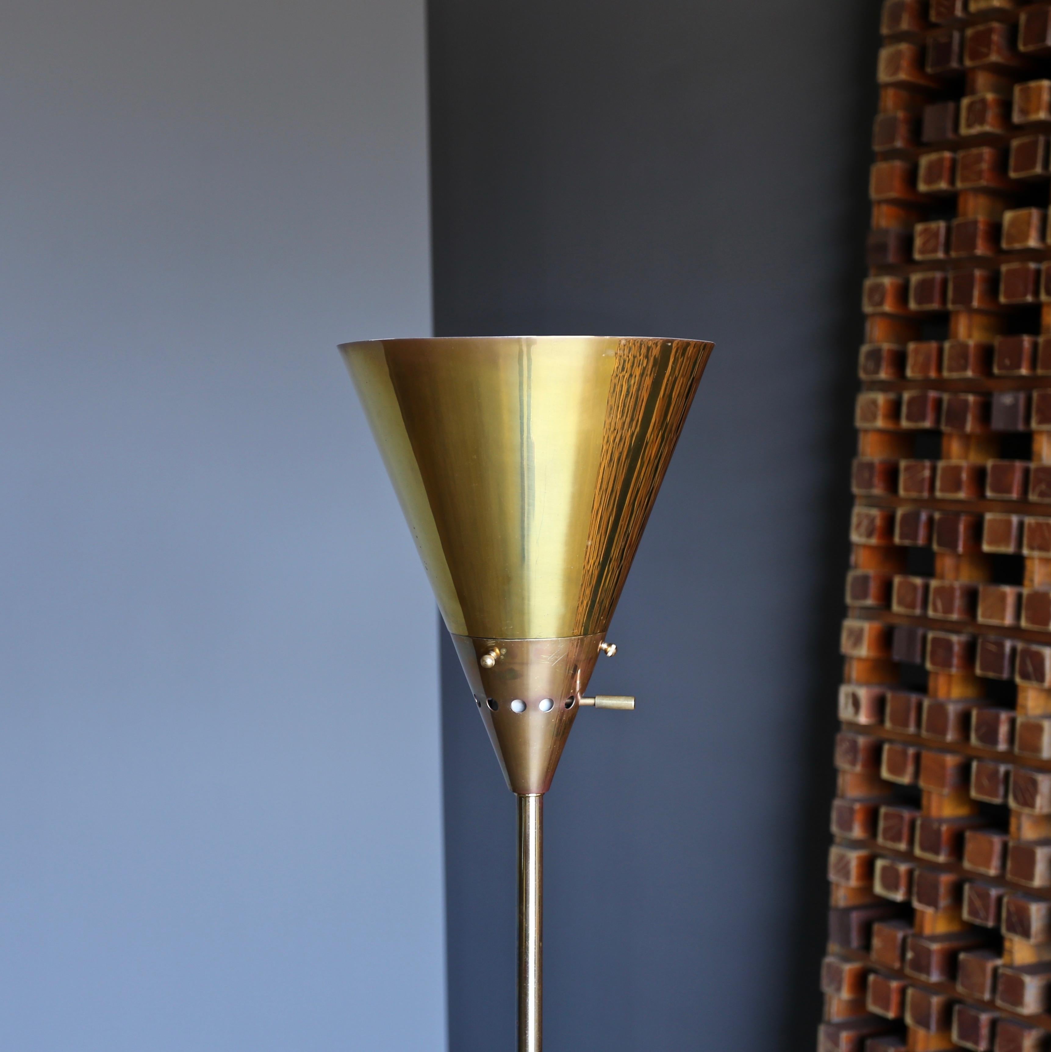 Early production circa 1945 “Baldry” indirect floor lamp (model 13), designed by Harry Weese. Substantial solid brass construction with iron base. Harry Weese designed products were sold through the ground breaking modern design retailer in Chicago,