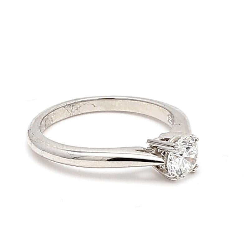 Designer:
Harry Winston


Title:
Cartier 0.53 Carat Round Brilliant E VVS1 Diamond Platinum Engagement Ring


Style:
Engagement


Metal:
Platinum


Gemstone 1:
0.53 Carat Diamond


Number of Stones:
1


Color:
E


Clarity:
VVS1


Shape:
Round