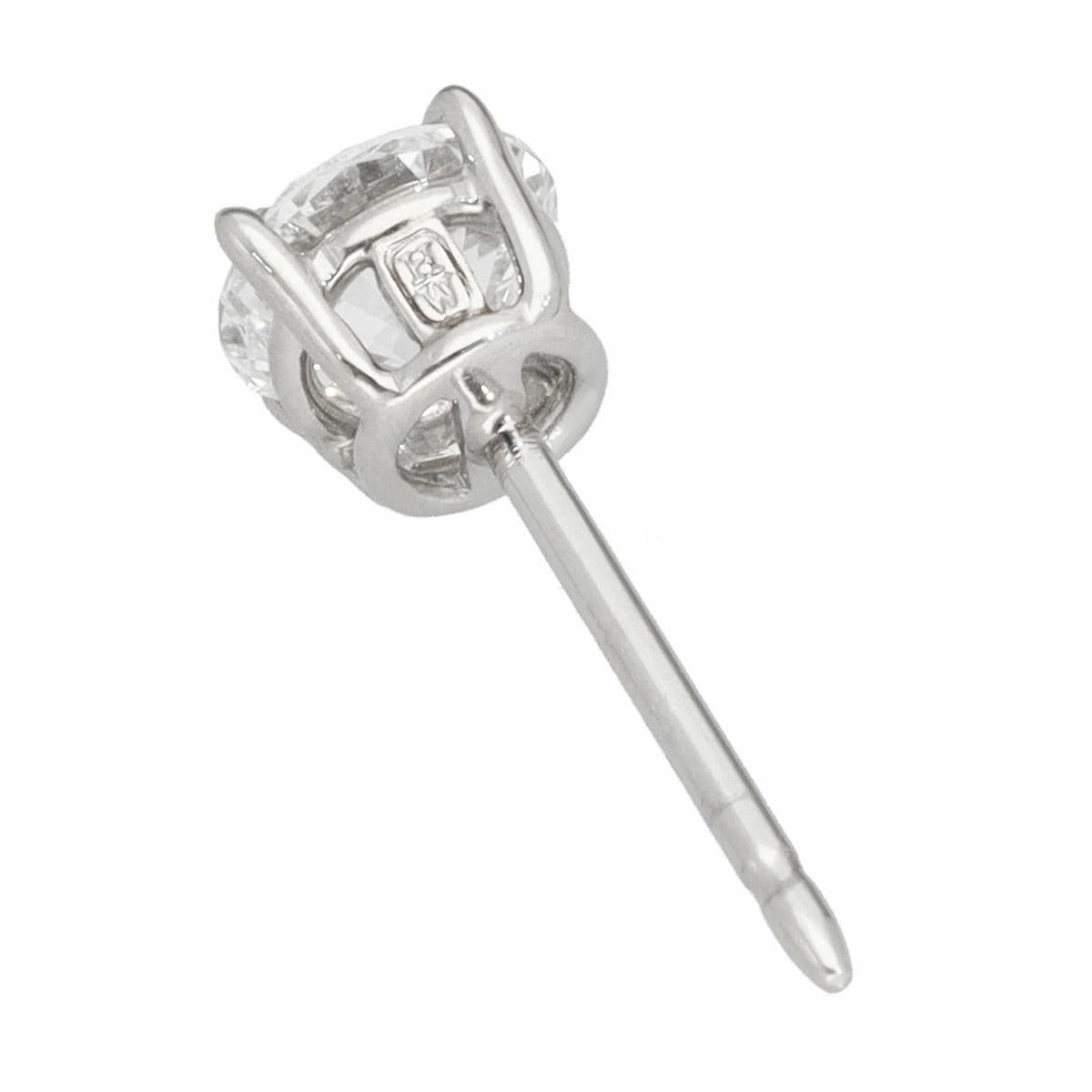 HARRY WINSTON 0,59 ct / 0,50 ct Pt950 Solitario talla redonda Pendientes en venta 1