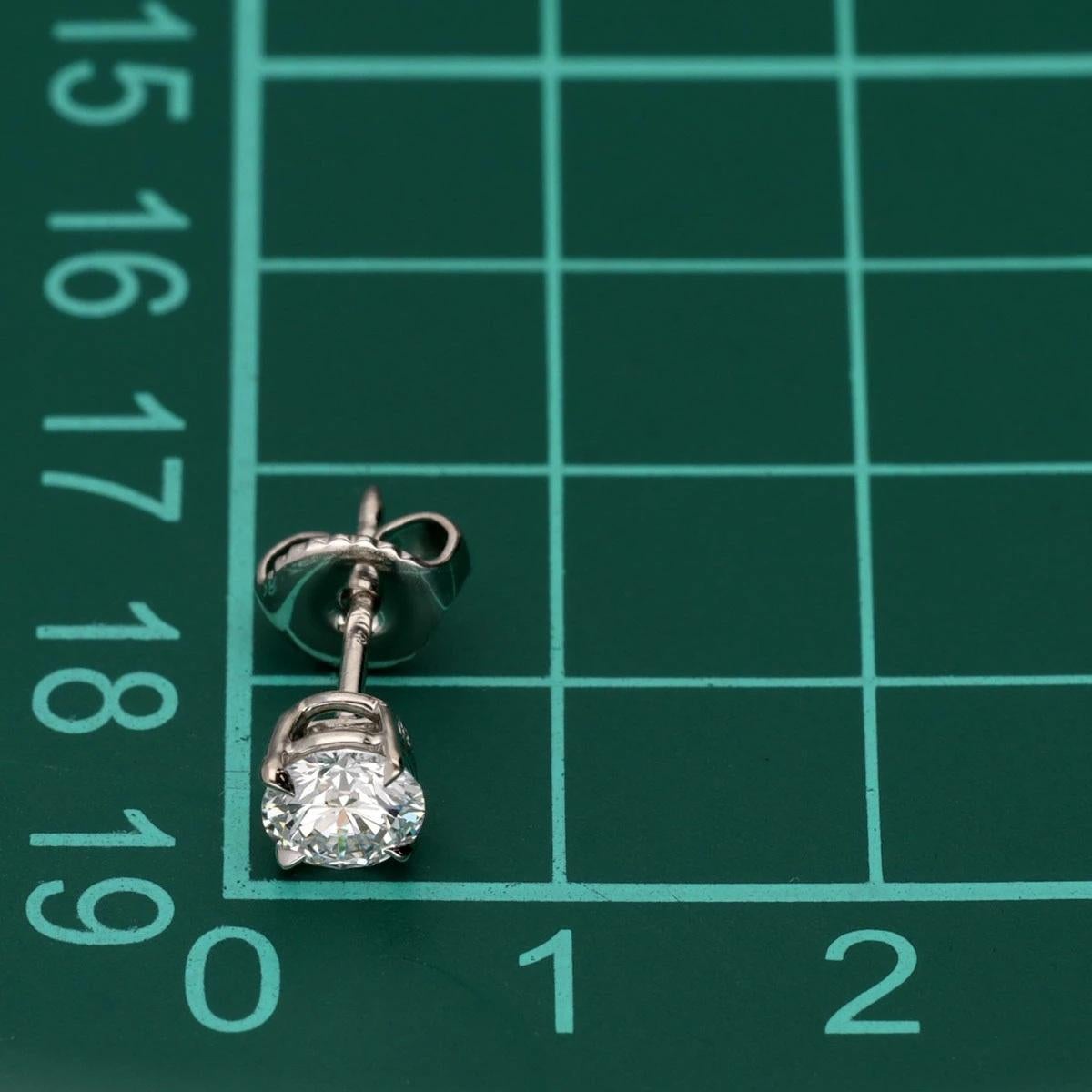 HARRY WINSTON 0,59 ct / 0,50 ct Pt950 Solitario talla redonda Pendientes en venta 2
