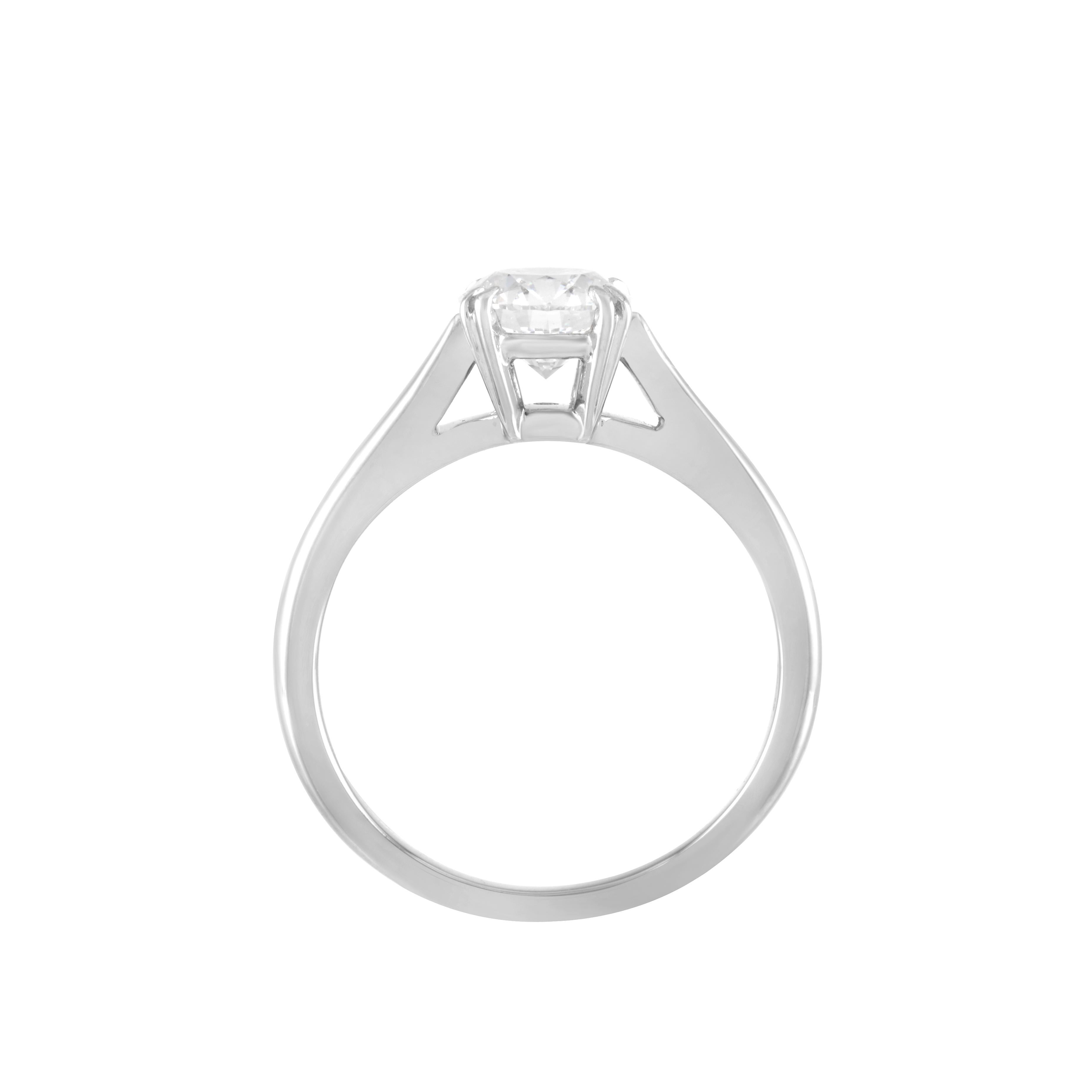 Harry Winston platinum round diamond solitaire engagement ring.

The center stone of this ring is a 0.71 carat round diamond with E color and VVS2 clarity accompanied by a GIA report in a Harry Winston folder.  The cut grade, polish and symmetry of