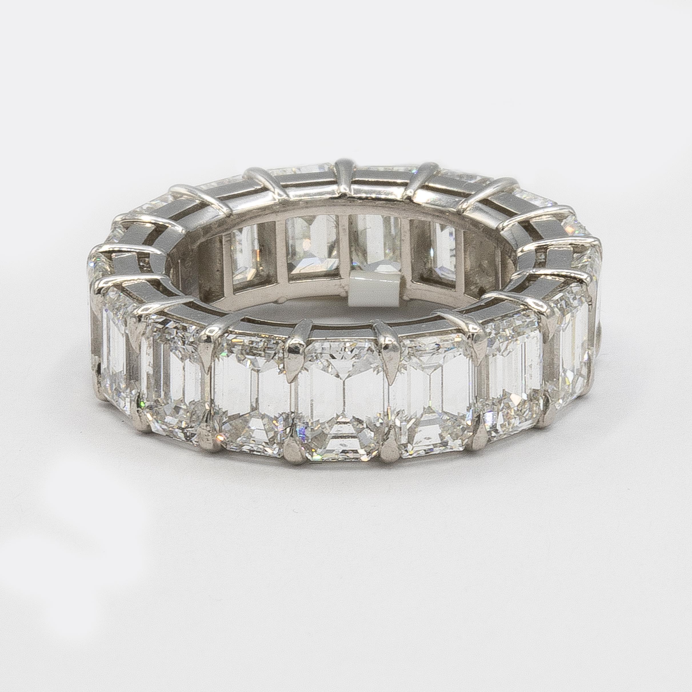 Emerald-Cut Diamond Wedding Band features a full circle of emerald-cut diamonds set in a shared-prong platinum setting.

17 Diamonds weighing a total of approximately 10.36 carats.

Diamonds = 10.36 carats
( Color: D-E, Clarity: VS )
Platinum
Ring