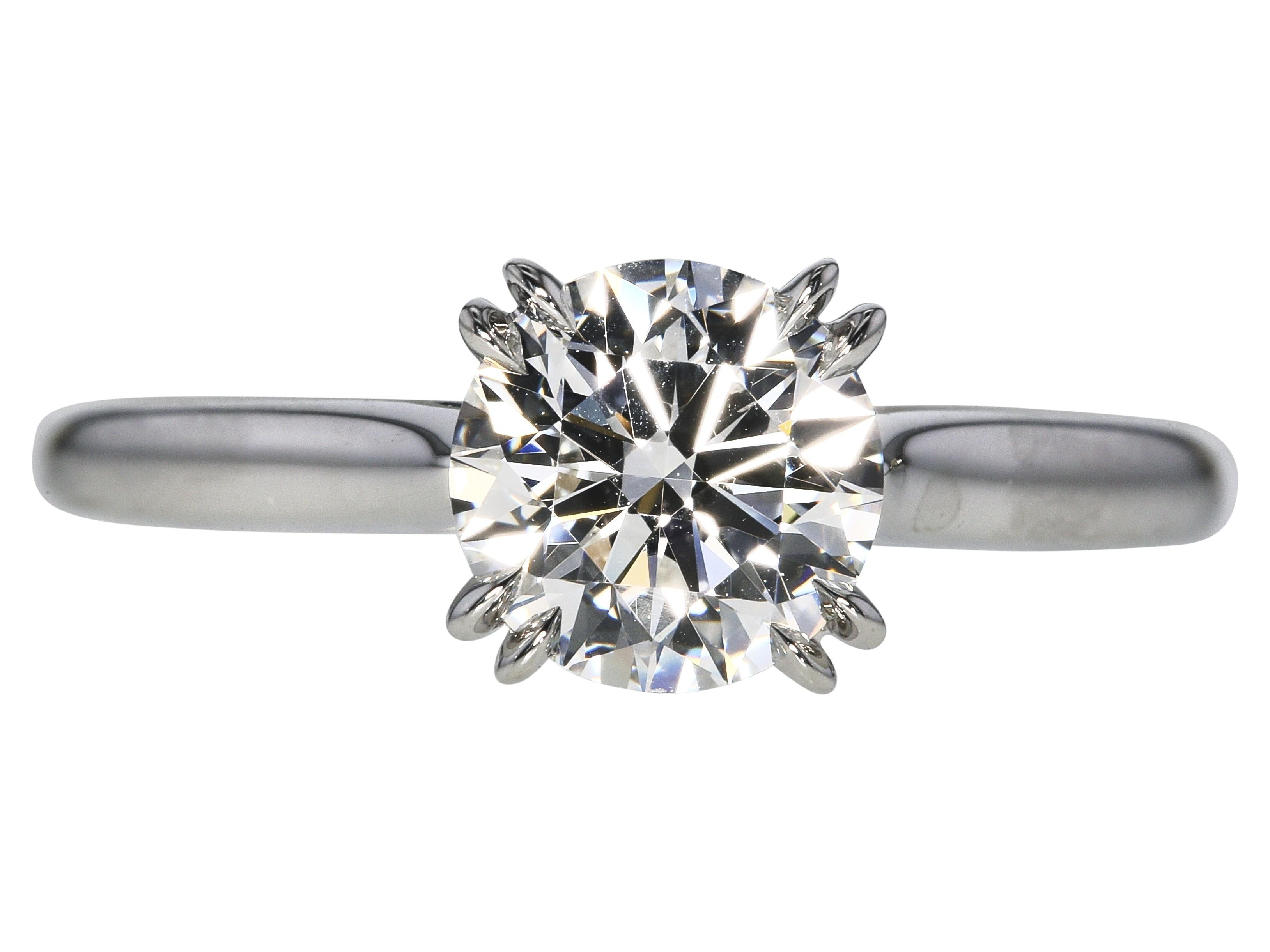Designer:
HARRY WINSTON


Title:
Harry Winston 1.32 Carat Round Brilliant D VVS1 Diamond Platinum Engagement Ring


Style:
Engagement


Metal:
Platinum


Gemstone 1:
1.32 Carat Diamond


Number of Stones:
1


Color:
D


Clarity:
VVS1


Shape:
Round