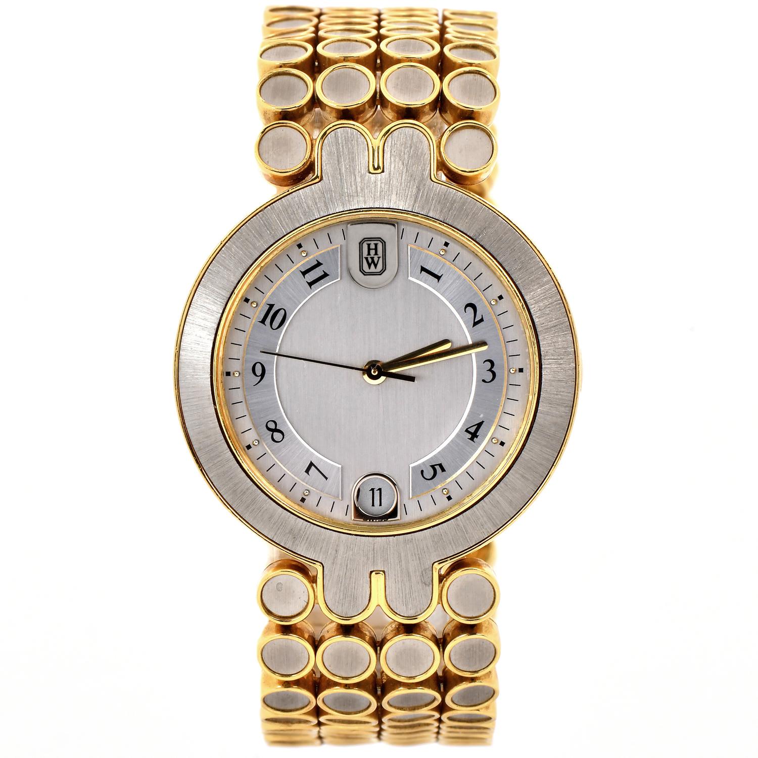 Diese Harry Winston 18K Gold Uhr ist ein Meisterwerk, das Raffinesse, Funktionalität und tadellose Handwerkskunst harmonisch miteinander verbindet.

Die Kombination aus 18 Karat Gelb- und Weißgold schafft einen harmonischen Kontrast, der die Blicke