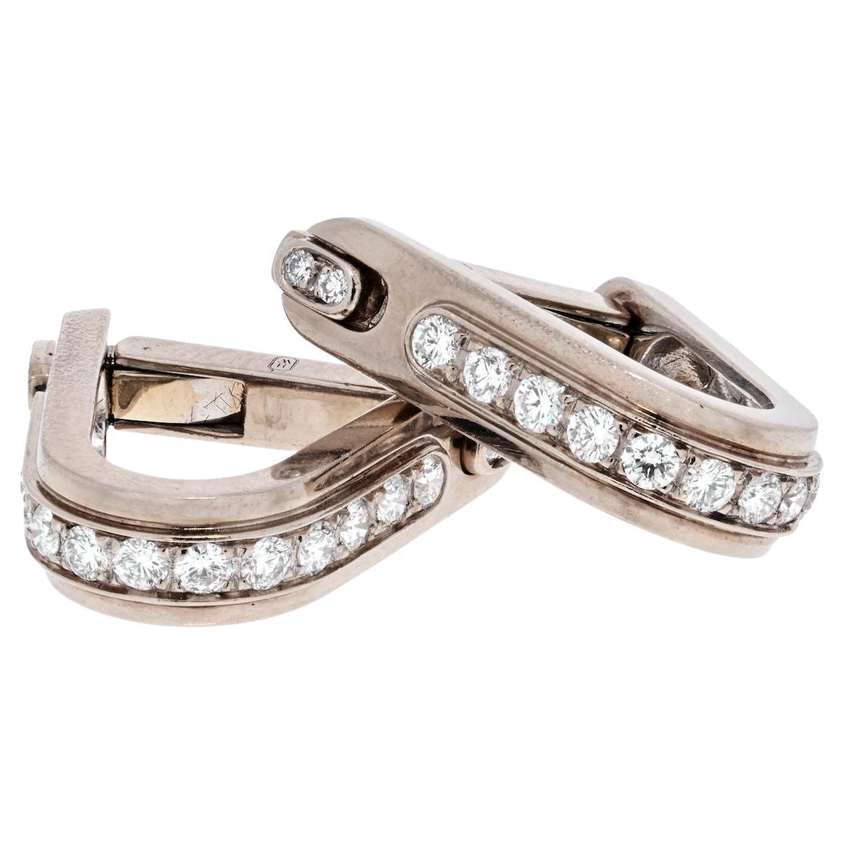 Harry Winston Diamonds & 18k White Gold Stirrup Arched Wraparound Cufflinks.
Harry Winston cufflinks are designed for the sartorialist. The arched shaped wraparound style cufflinks are made in 18k white gold and accented by 34 pave set diamonds
