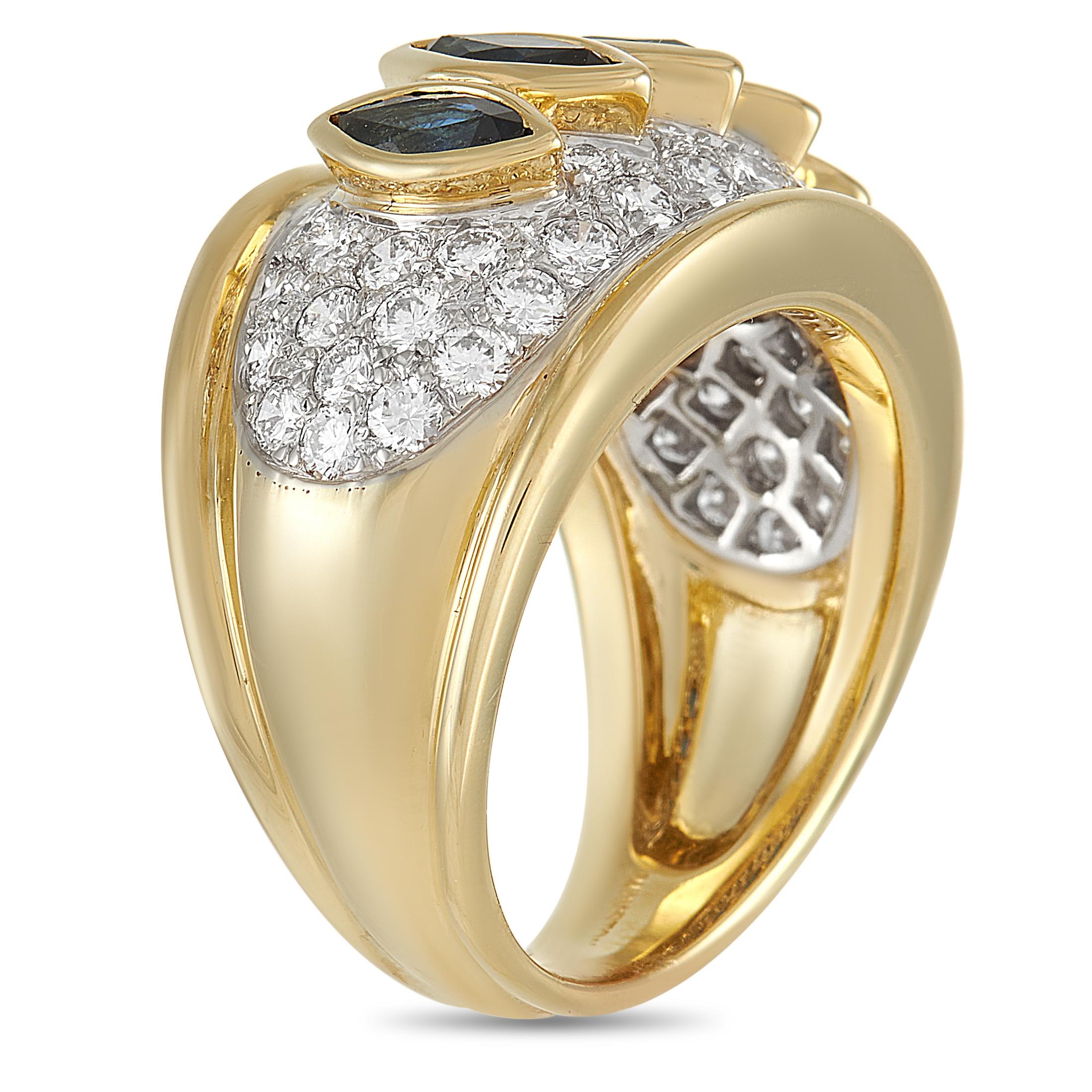 This Harry Winston ring features an opulent appearance that is virtually impossible to ignore. Its commanding presence begins with the 18K Yellow Gold band measuring 7mm wide. An array of glittering diamonds totaling 1.50 carats featuring E color