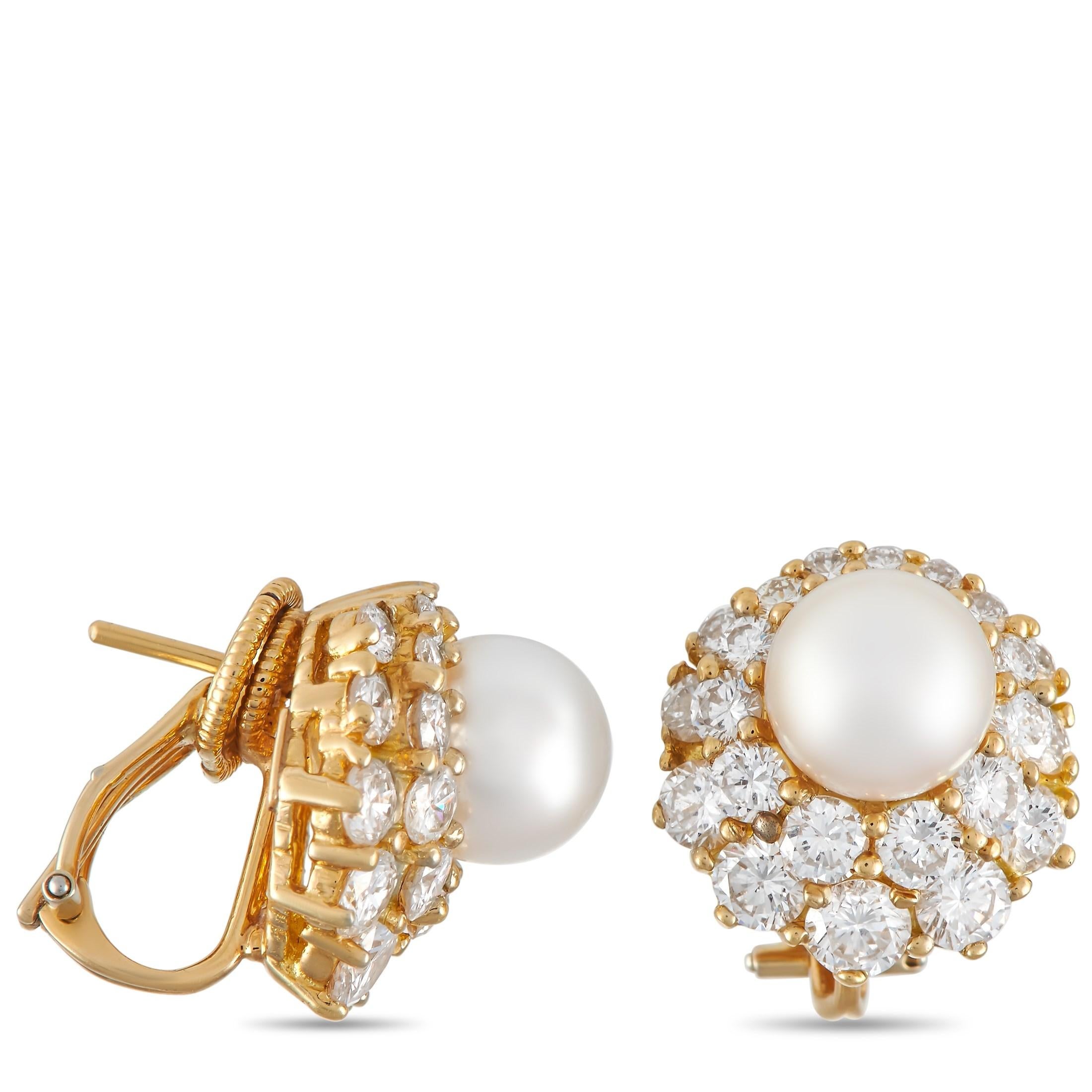 With class and sophistication that has effortlessly endured the test of time, this Harry Winston 18K Yellow Gold 3.70 ct Diamond and Pearl Earrings will complete your jewelry collection. Each earring features a yellow gold frame with omega back