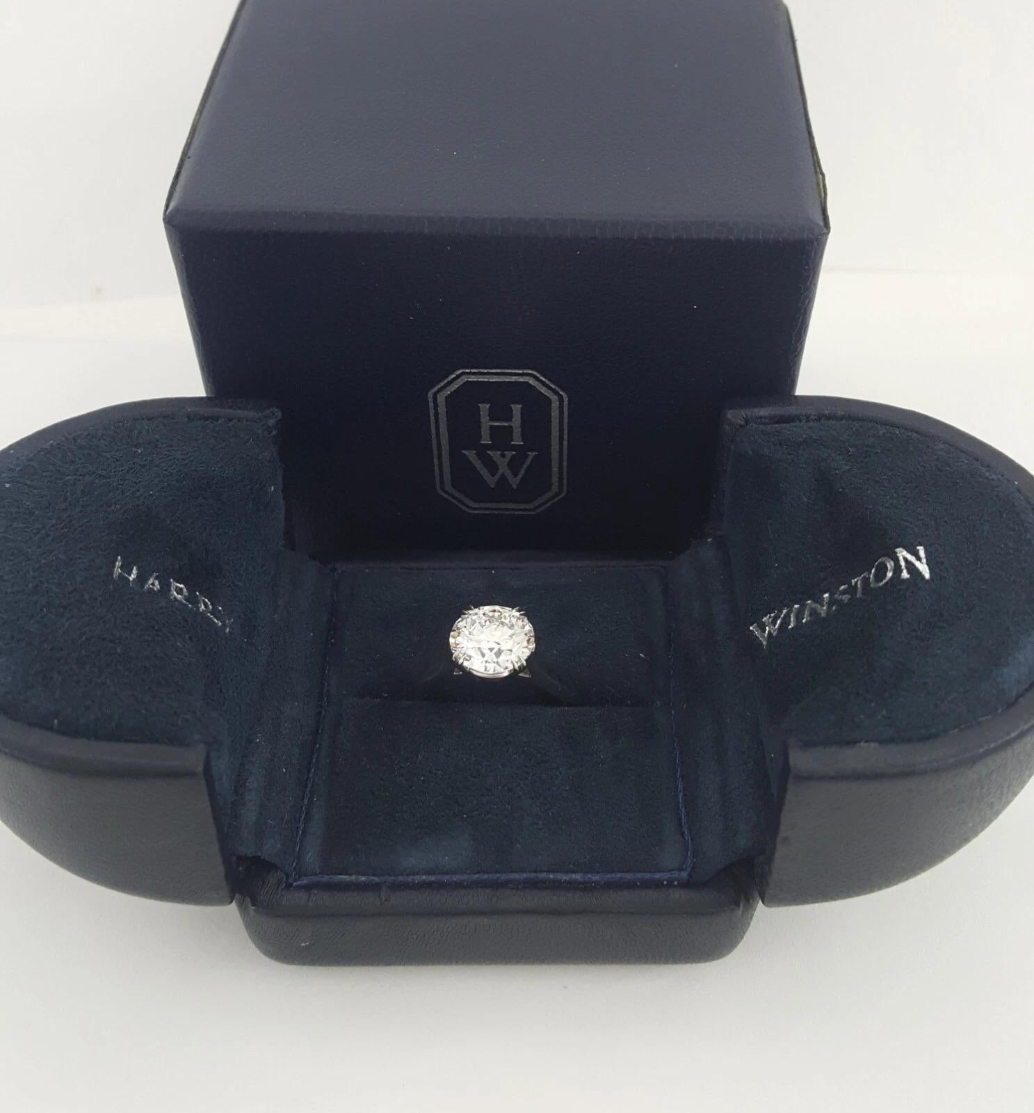 Harry Winston 2.34 Carat Round Brilliant Diamond Platinum Engagement Ring

A timeless masterpiece by Harry Winston, this exquisite platinum engagement ring showcases a captivating 2.34 carat natural Round Brilliant Cut diamond, certified by GIA. The