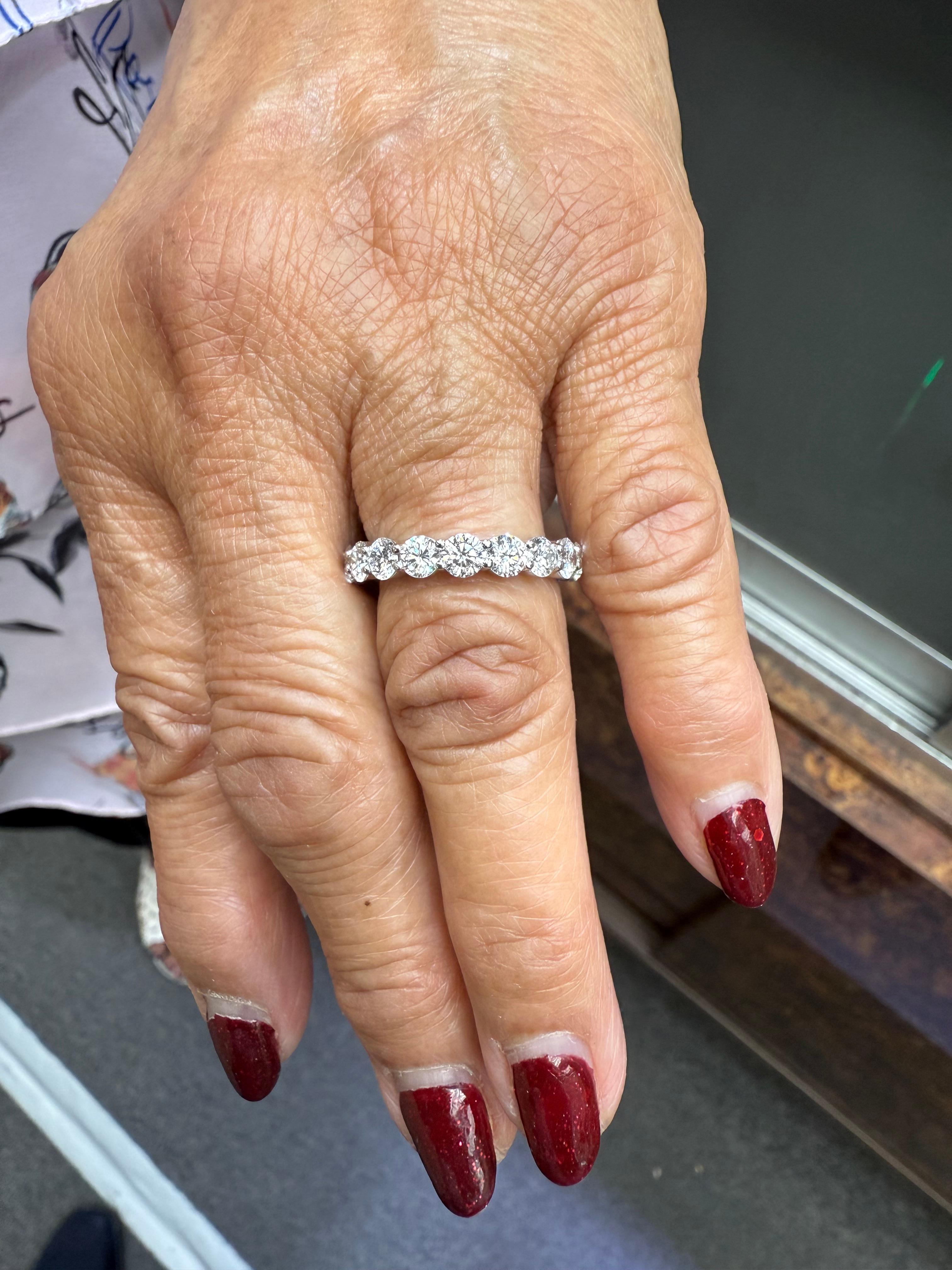 Harry Winston 3 CTW Round Brilliant Diamond Platinum Eternity Band Ring Size 6.

The Harry Winston Round Brilliant Cut Diamond Platinum Eternity Band Ring is a Size 6.  This is a shared-prong set eternity band.  The diamonds in the ring are amazing,