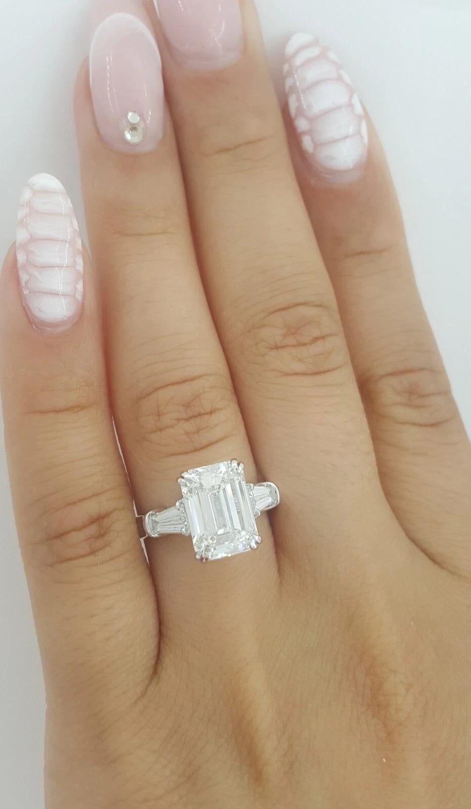 Women's Harry Winston 4.12 ct Total Weight Emerald Cut Diamond Ring For Sale