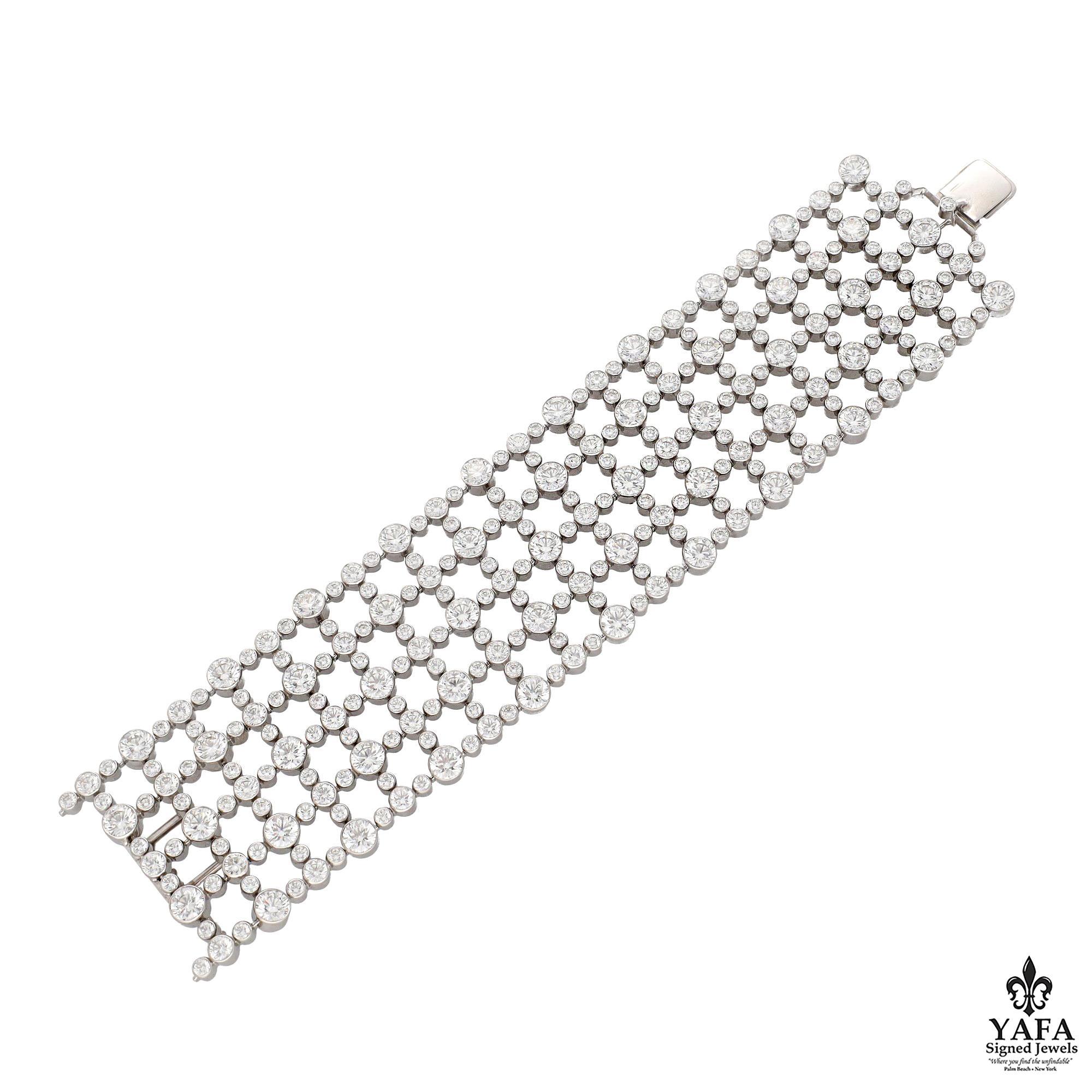 A Set of Two Flexible Design Bracelets Each Composed of Five Rows with of Round Diamonds.
Approximate Diamond Weight - 150 CTS  
Color F-G  
Clarity  VVS - VS
Signed - Harry Winston