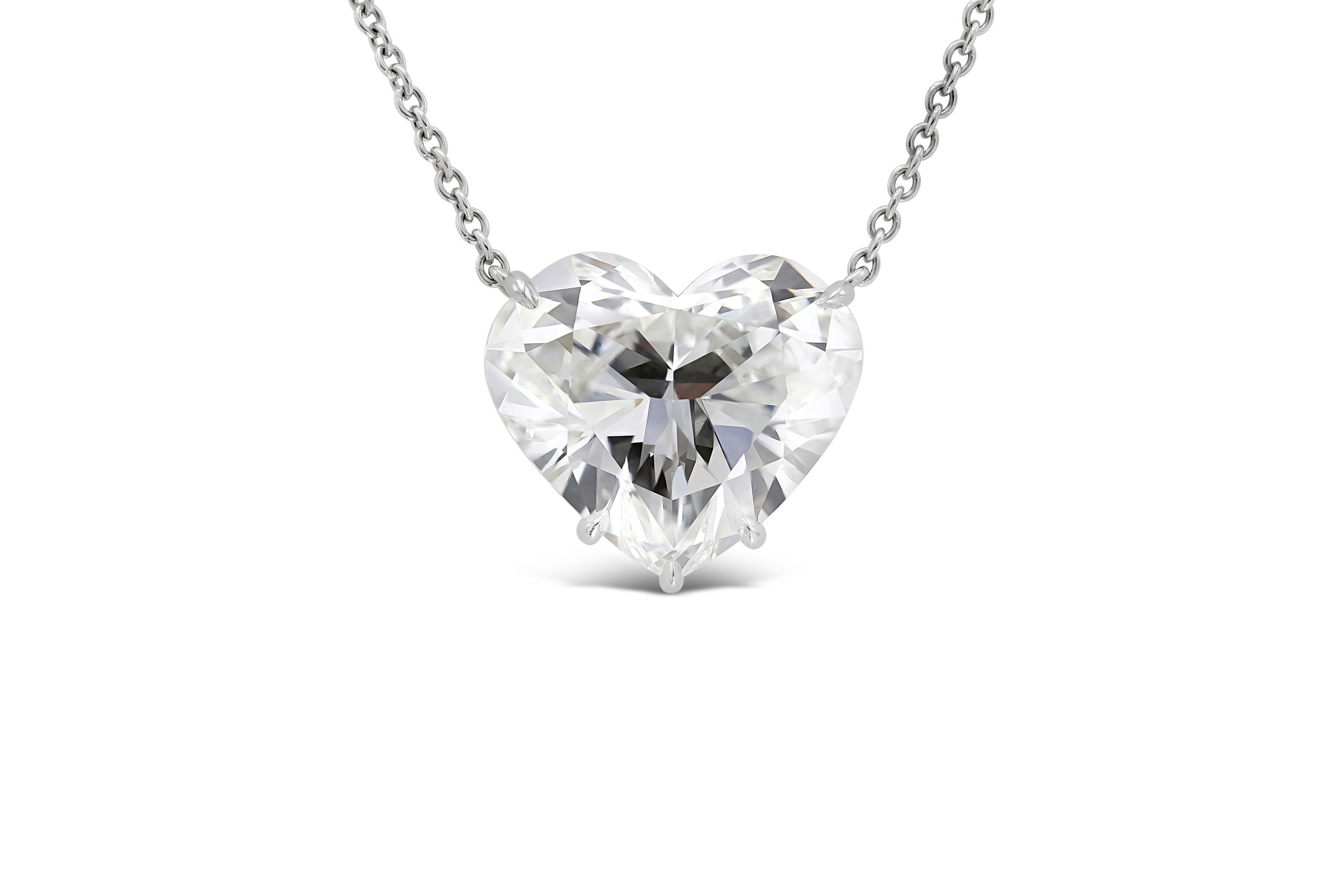 Finely crafted in platinum featuring a heart-shaped diamond weighing 5.63 carats with E color and VS1 clarity.
Signed by Harry Winston.
Accompanied by GIA Report #16836660 and Harry Winston certificate and box.