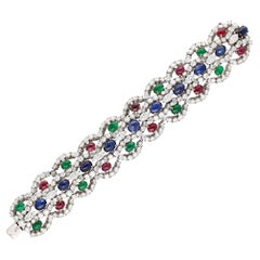 HARRY WINSTON Bracelet cabochon saphir, émeraude, rubis et diamants