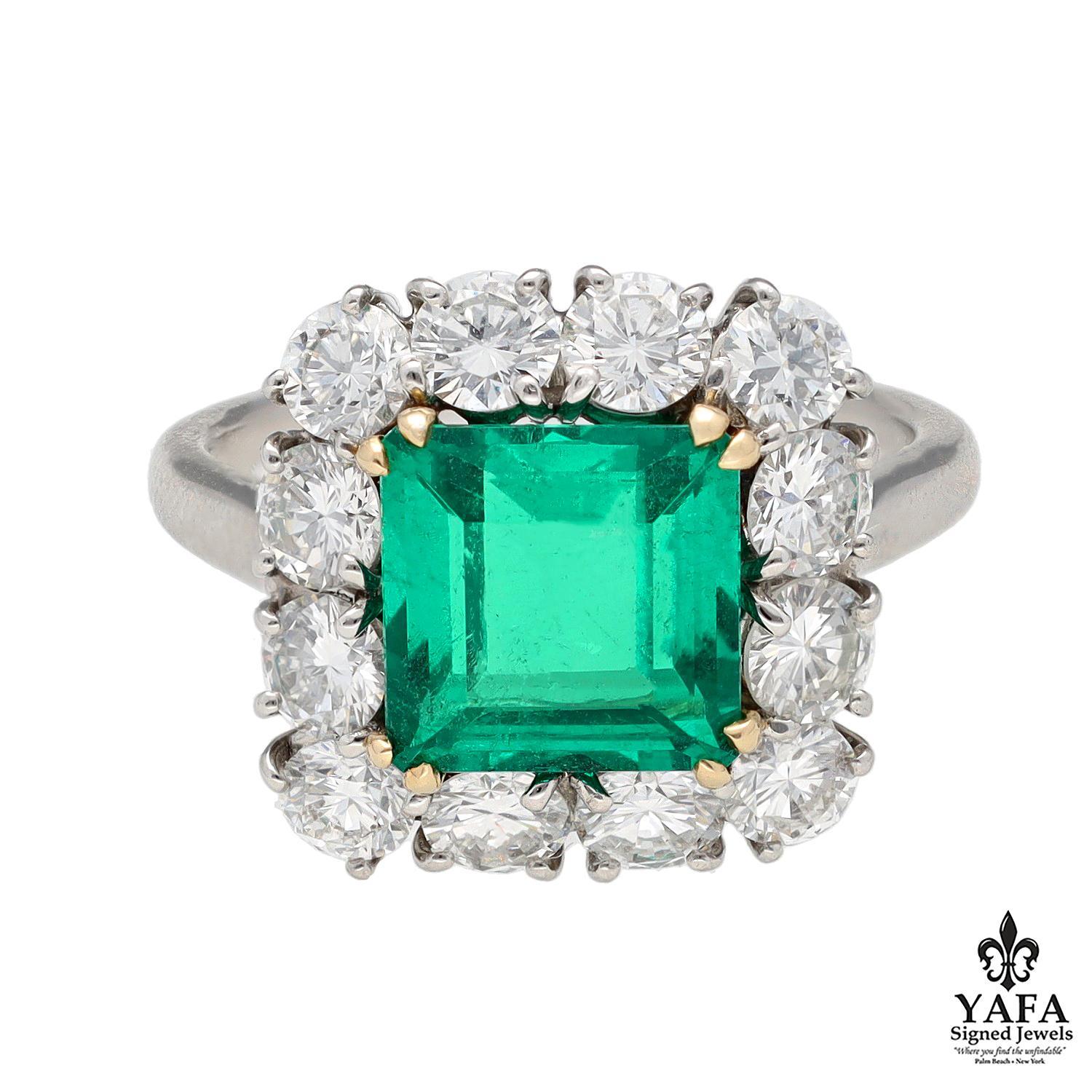 2.50 CTS No Oil Colombian Emerald
Platinum Mounting containing 12 Round Brilliant Diamonds
Signed - Winston