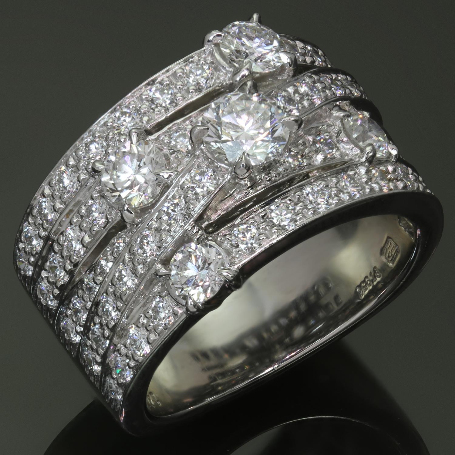 This stunning Harry Winston ring features a crossover design is crafted in 950 platinum and features 5 overlapping rows of round brilliant-cut diamonds - a total of 57 diamonds weighing an estimated 2.16 carats. Made in United States circa 2009.