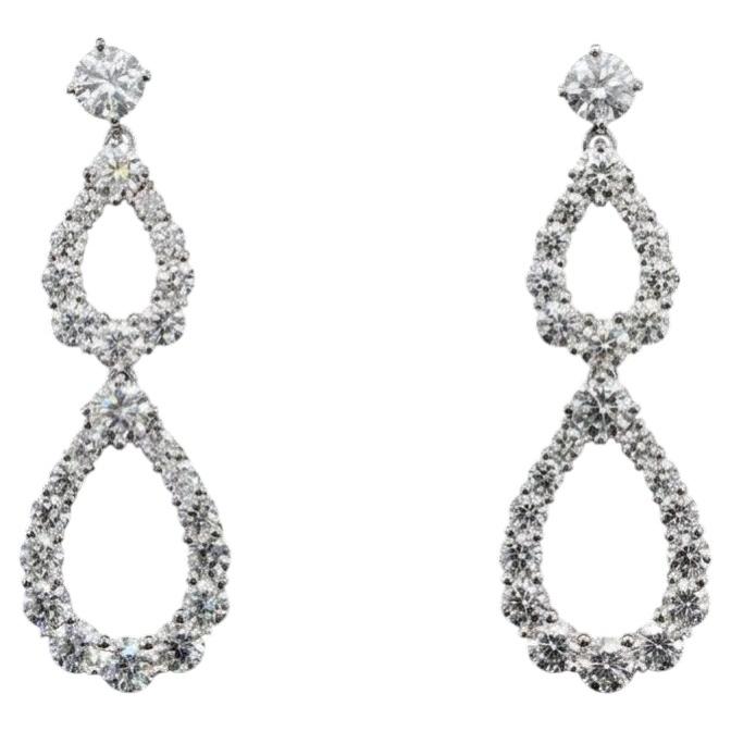 Orecchini a cerchio con diamanti Harry Winston in platino