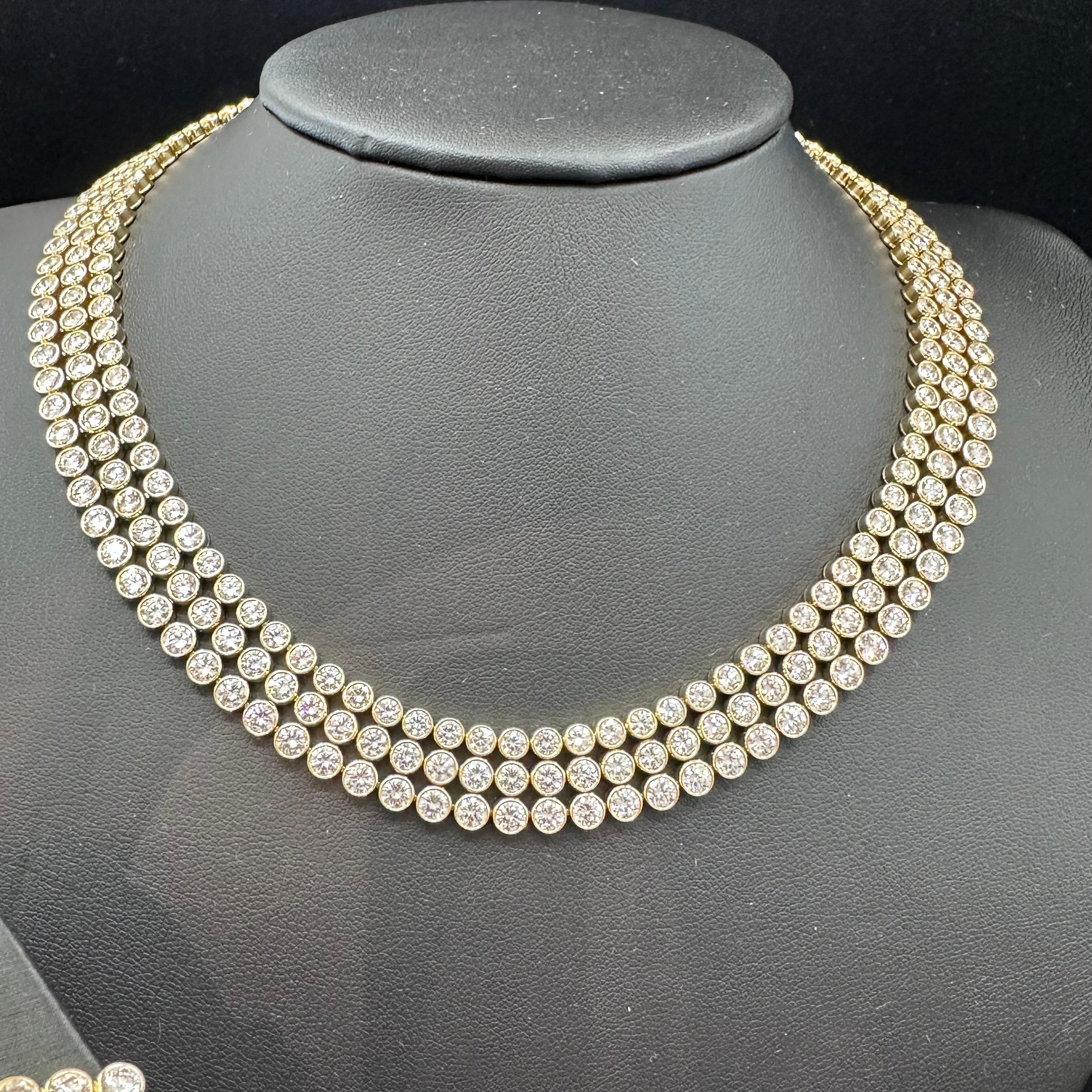 Harry Winston, Diamond Necklace, Bracelet and Earring set, Circa 1990's
282 diamonds with a Total Diamond Weight 73.60cts
Necklace 40 carats 
Bracelet 22.80 cts 
Earrings 10.80 cts
Diamond Quality: D-E Color and VVS clarity 
18 karat yellow gold