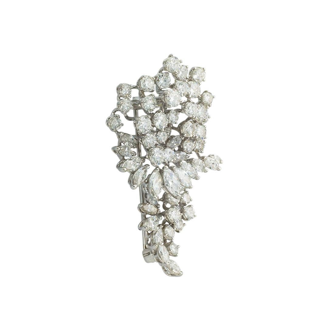 Harry Winston 6.70 carats of diamonds and platinum clip brooch, circa 1969.  Jacob's Diamond & Estate Jewelry.

ABOUT THIS ITEM:  #P-DJ522. Scroll down for detailed specifications.  The intricate design is set with over six carats of