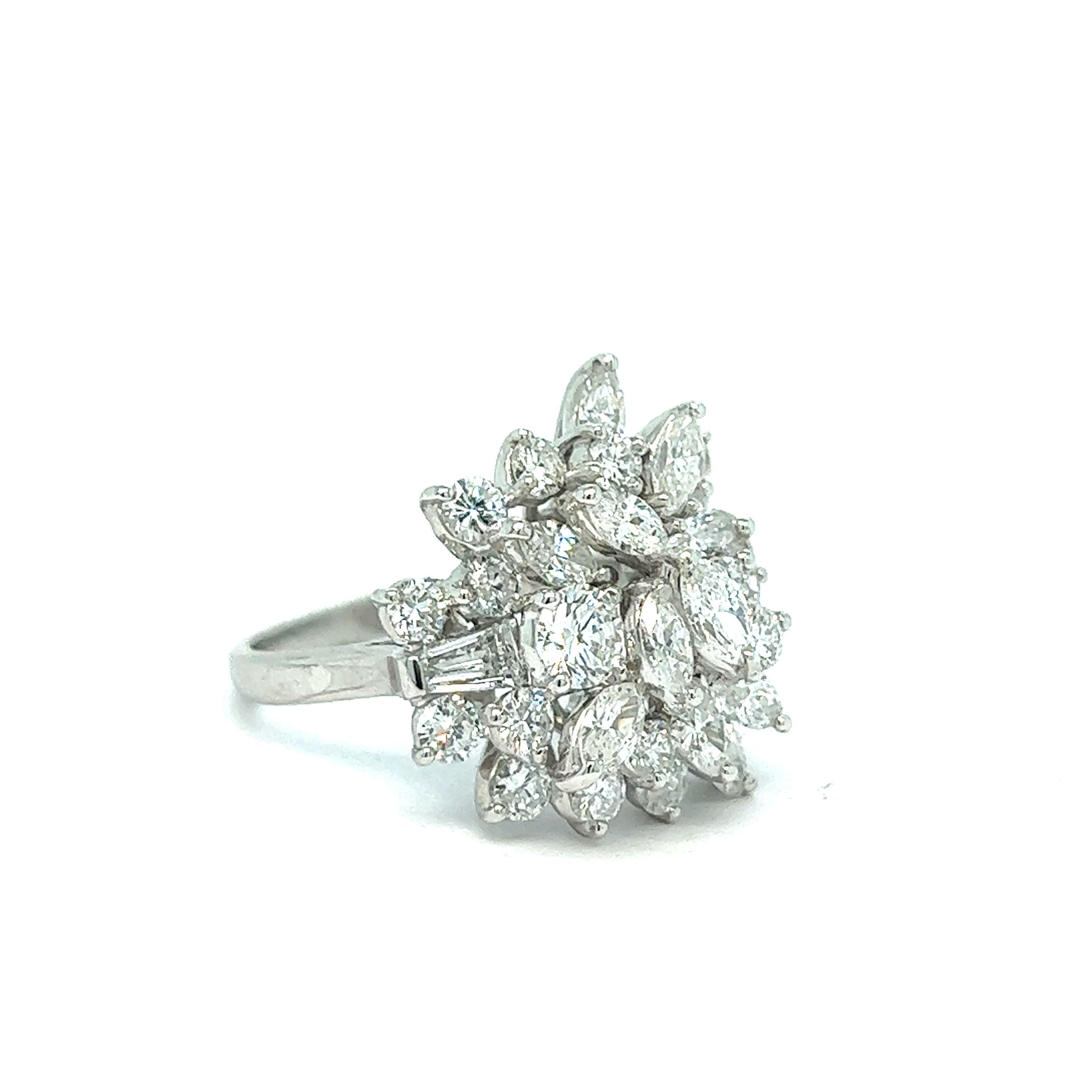 Harry Winston diamond platinum ring 

Beautiful and stunning ring made out of Marquise, round, and tapered baguette diamonds set in platinum; marked Winston, Pt950, PLAT

Size: 8 US
Total weight: 11.3 grams