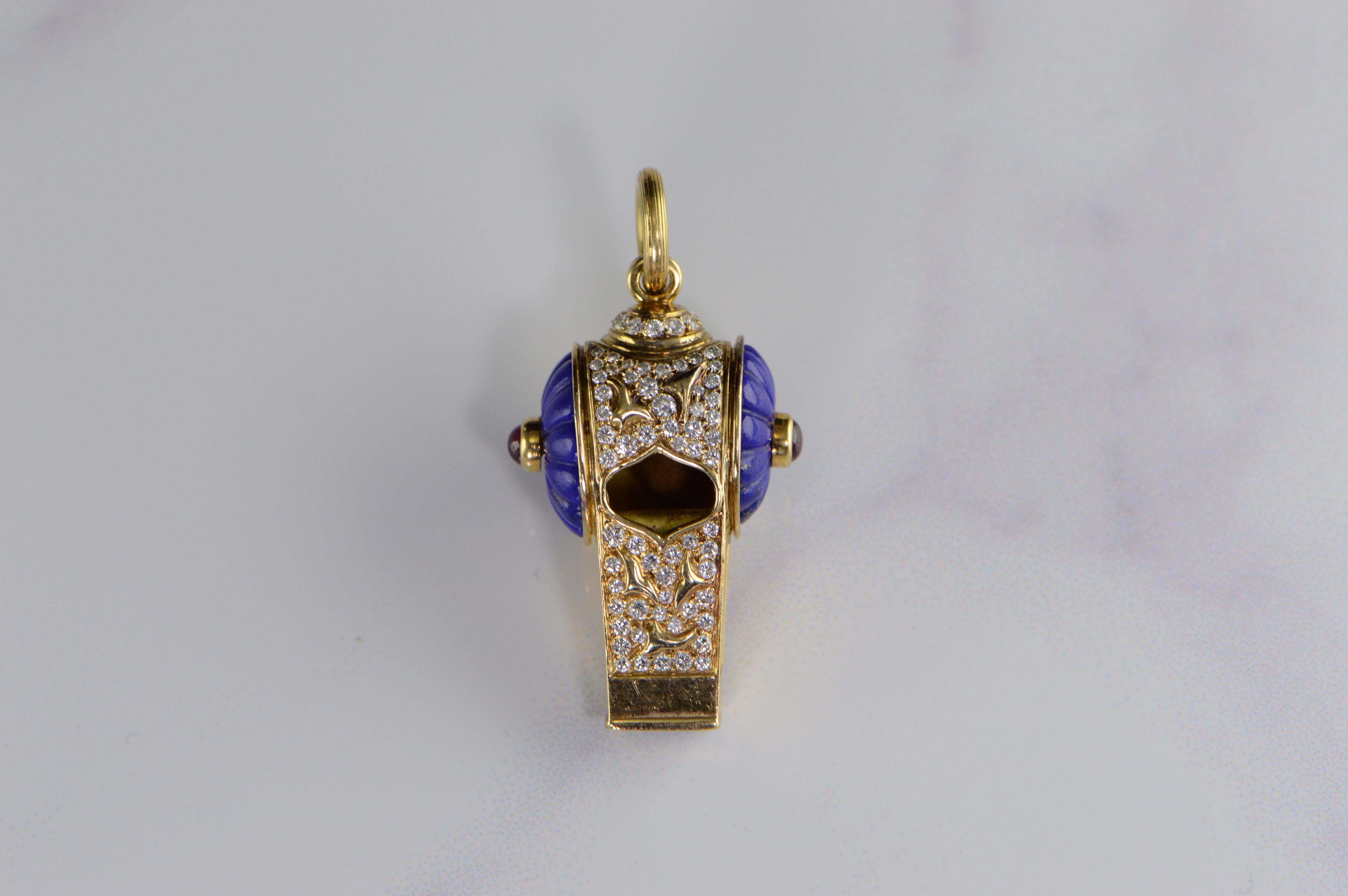 Harry Winston Diamond Ruby Lapis Whistle Pendant Charm 

Designer: Harry Winston

Circa: Vintage

Metal Composition: Solid 18k Yellow Gold

Weight : 21.05 Grams

Hallmarks: French Gold Marks for Harry Winston, 750

Dimensions: 46mm x 24mm

Carat