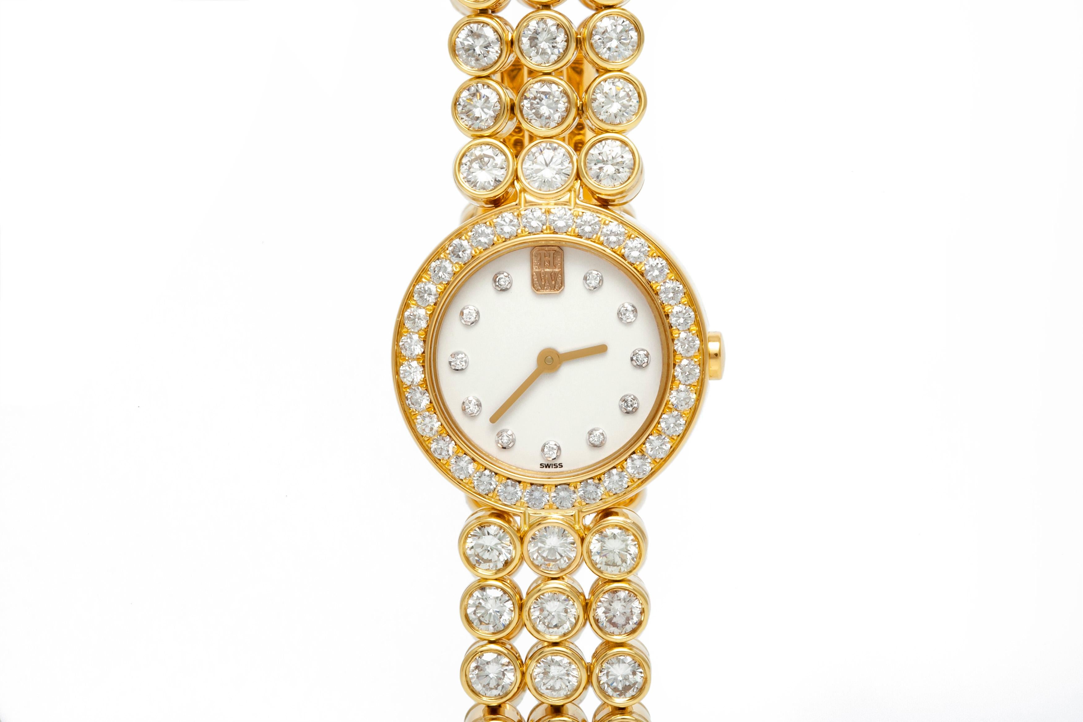 Watch signed by Harry Winston, finely crafted in 18k yellow gold with diamonds weighing approximately a total of 25.00 carat.