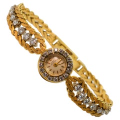 Harry Winston Montre-bracelet habillée en or jaune avec diamants pour femme