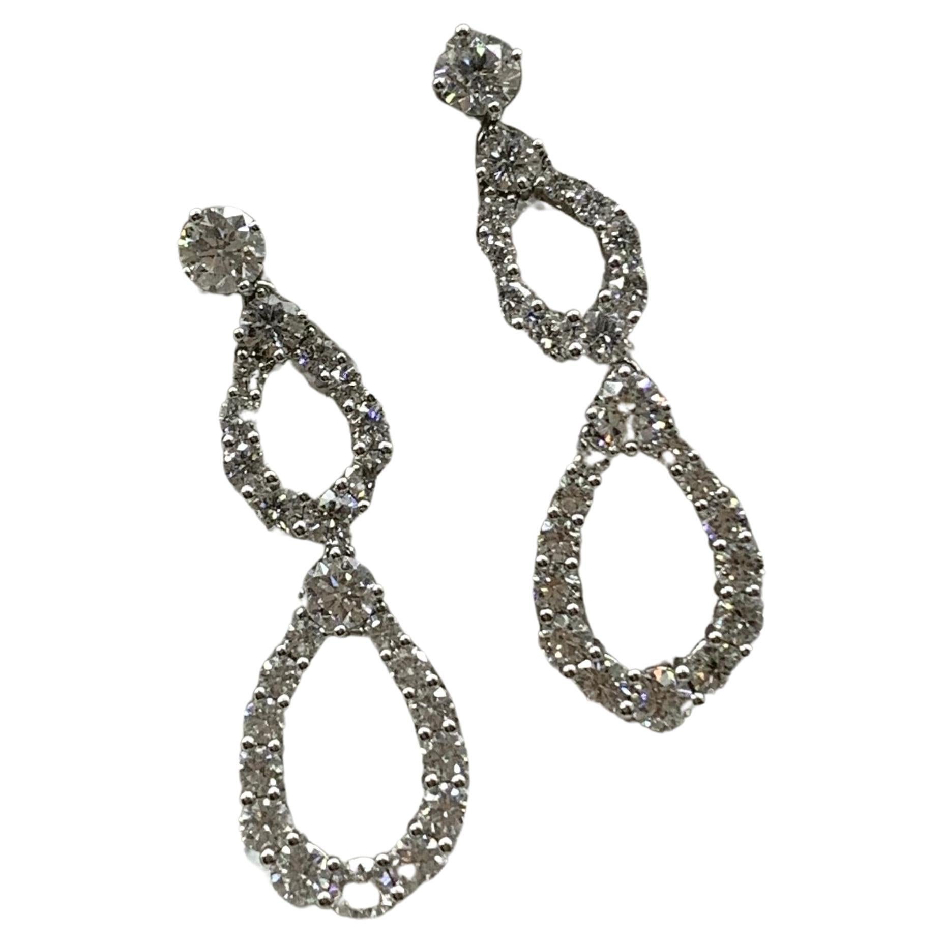 Art Deco Harry Winston Double Diamond Loop earrings  For Sale